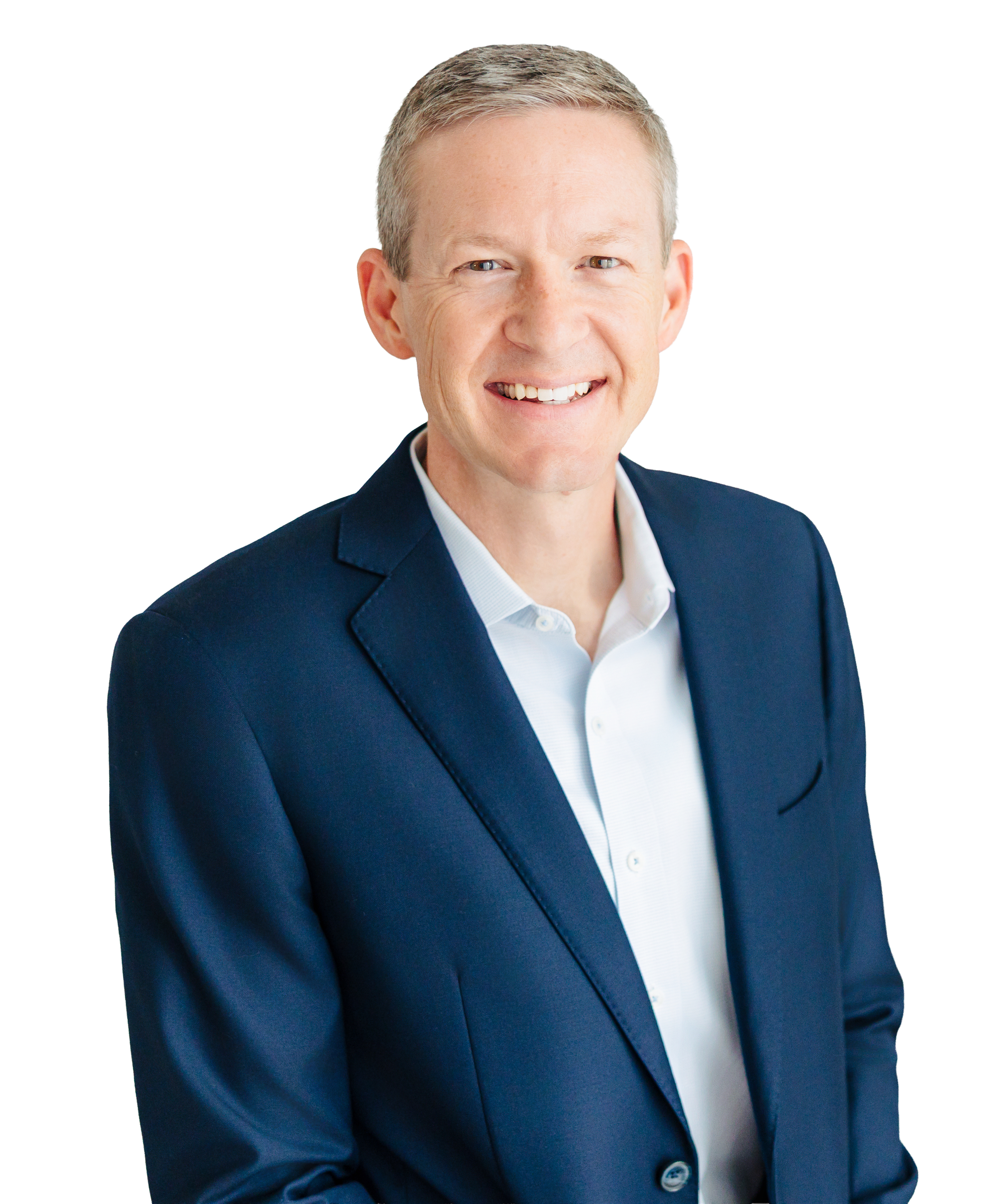Portrait of a smiling middle-aged man in a navy suit and white shirt, facing forward.