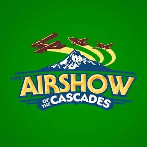 Logo for the Airshow of the Cascades featuring mountain and airplanes.