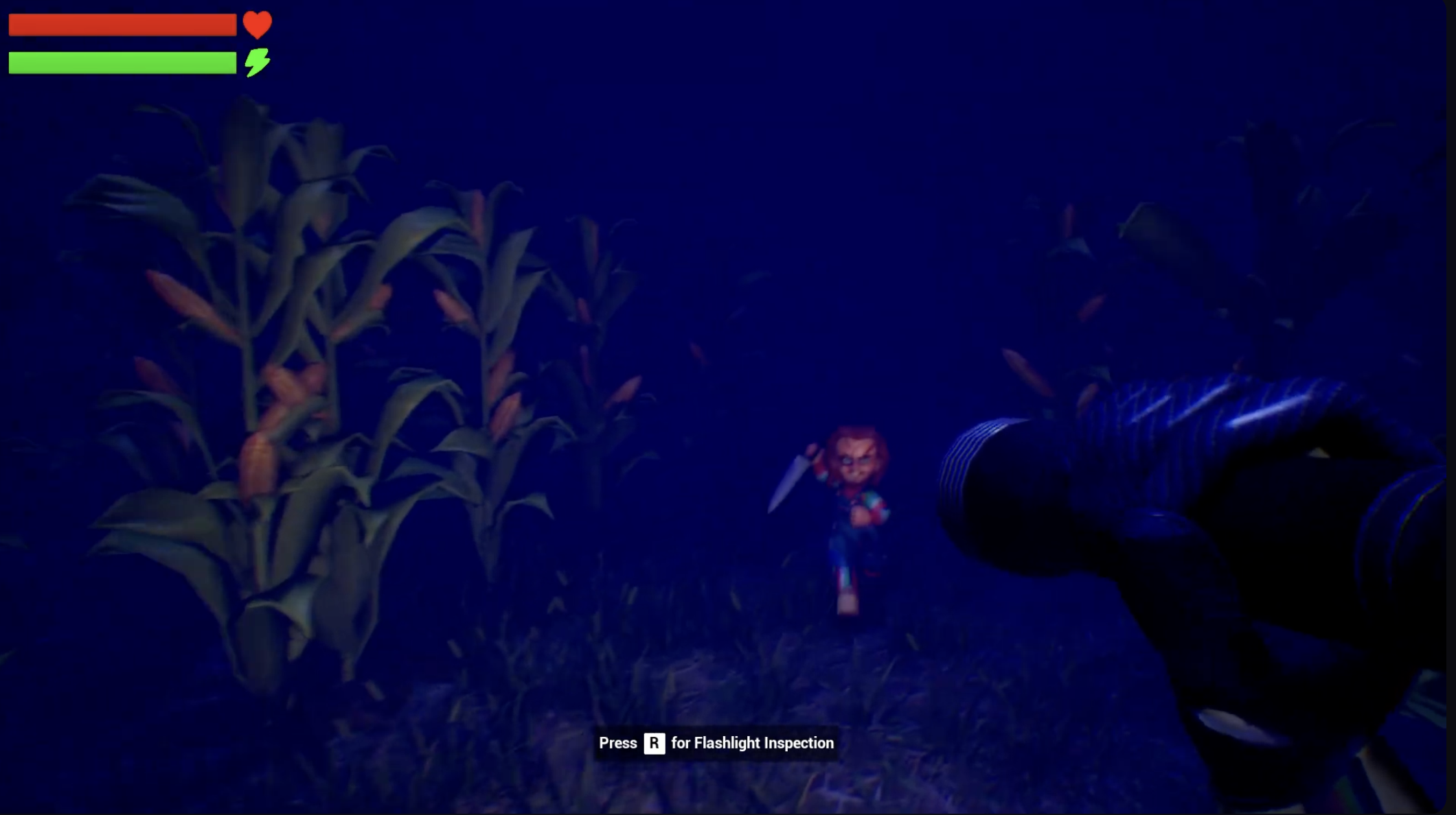 In a dark video game scene, a character holds a flashlight, illuminating a small doll-like figure holding a knife near a farm field with tall crops.