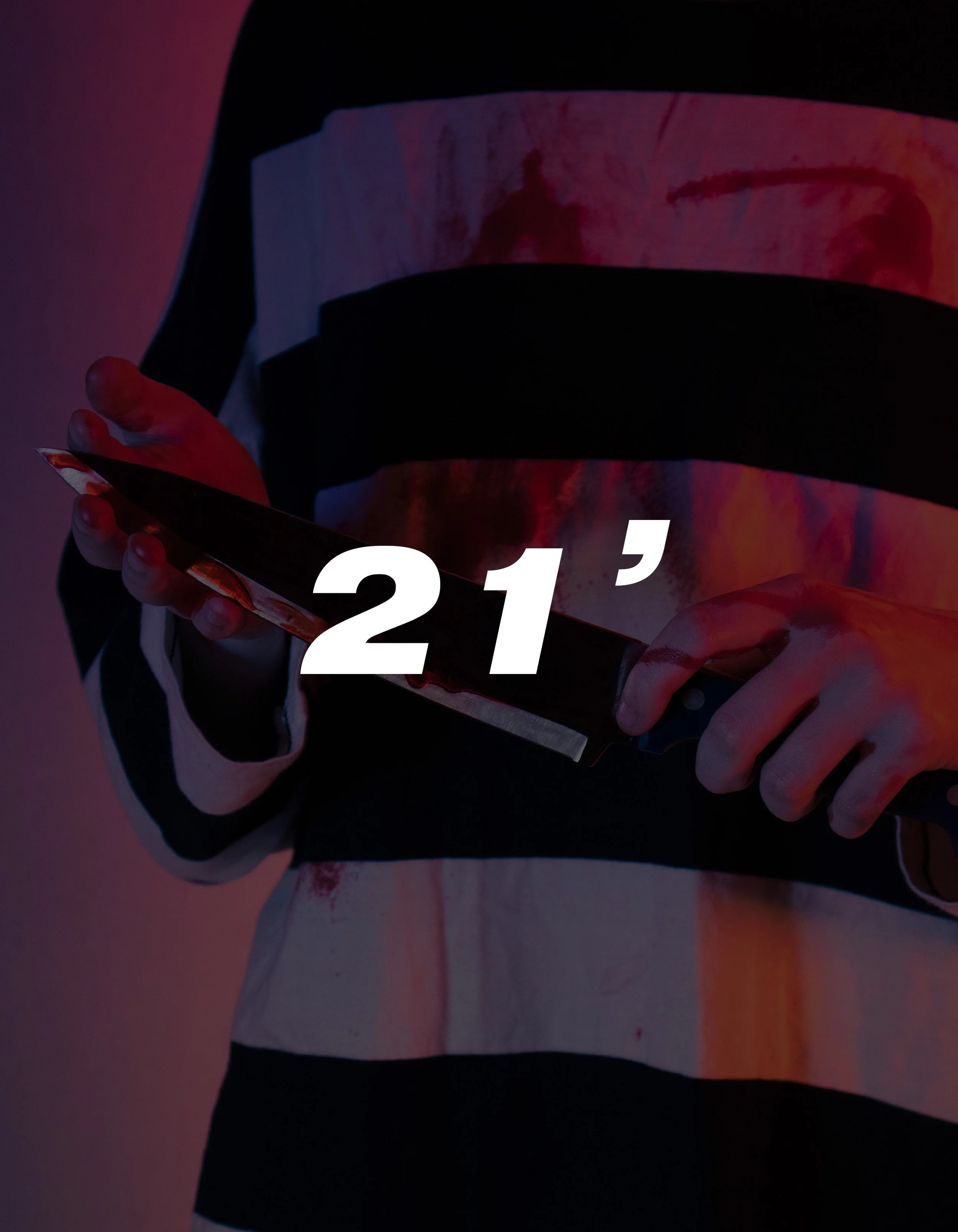 Person wearing black and white striped long-sleeve shirt holding a smartphone with large white text '21' and a small apostrophe overlayed.