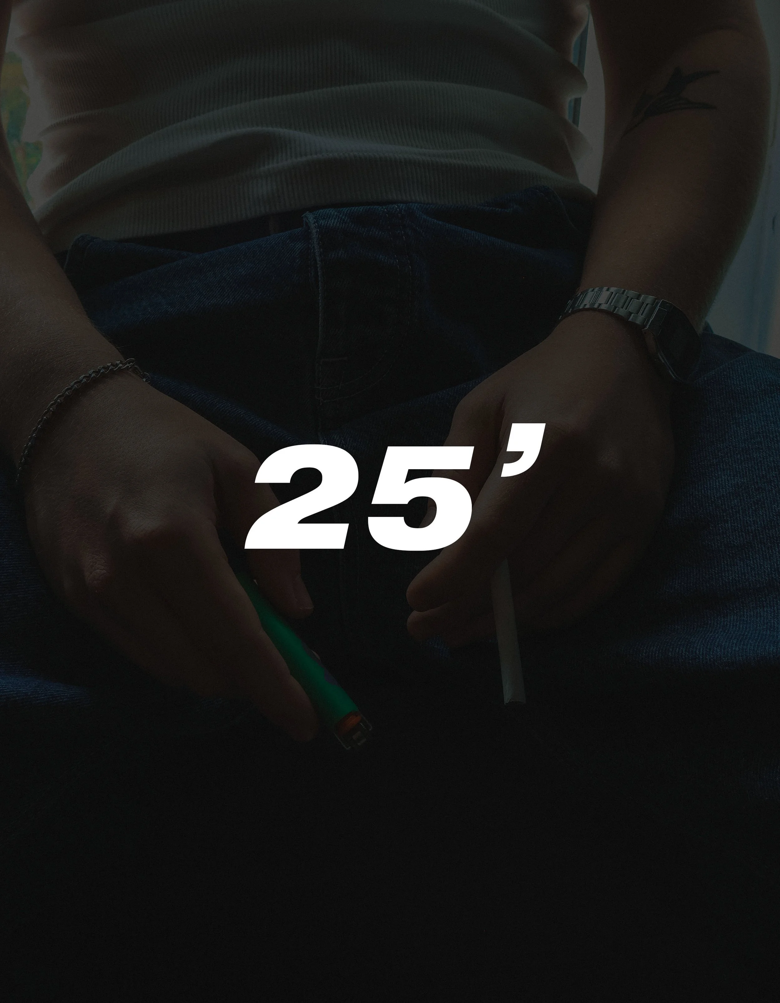 Person wearing a white shirt, dark jeans, holding a green lighter and a cigarette, with the number 25' overlaid.