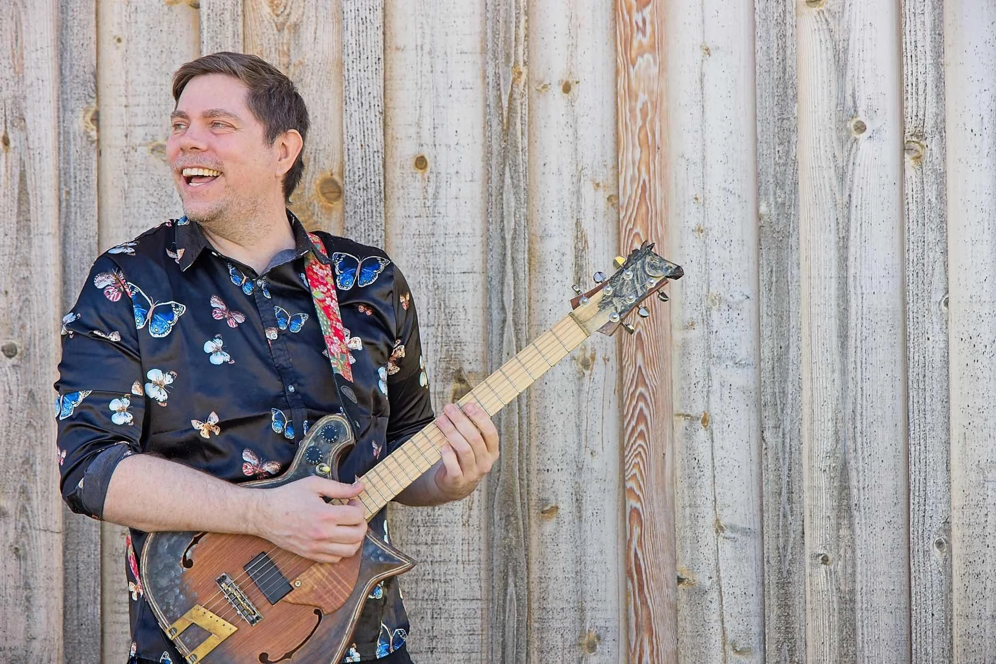 Small Town Guitarists by Murray Sampson. Photography. $185. 