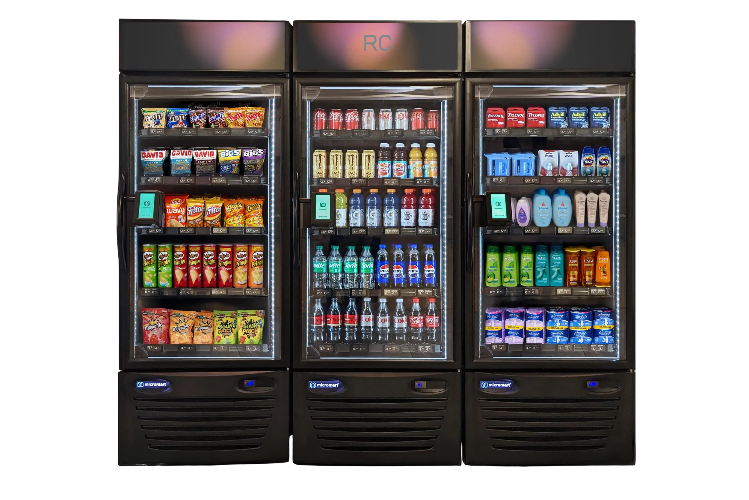 Three refrigerated vending machines filled with snacks, drinks, and personal care items, with black exteriors and digital displays.
