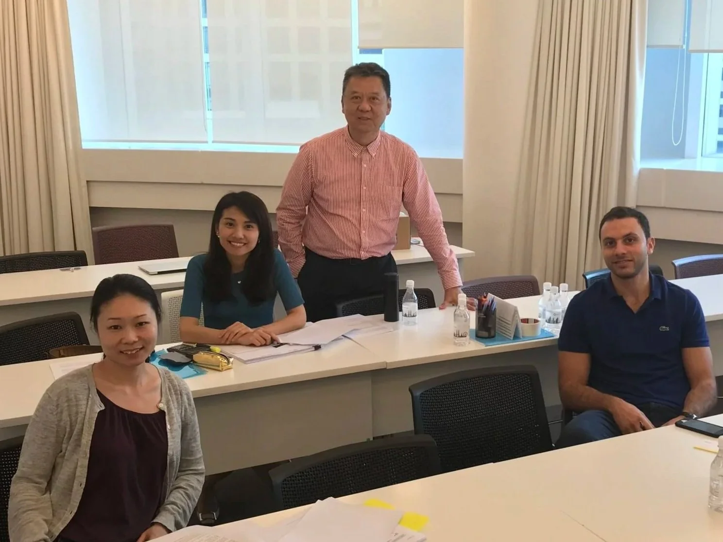 Khinloke delivering CACS exam preparation session in a classroom setting