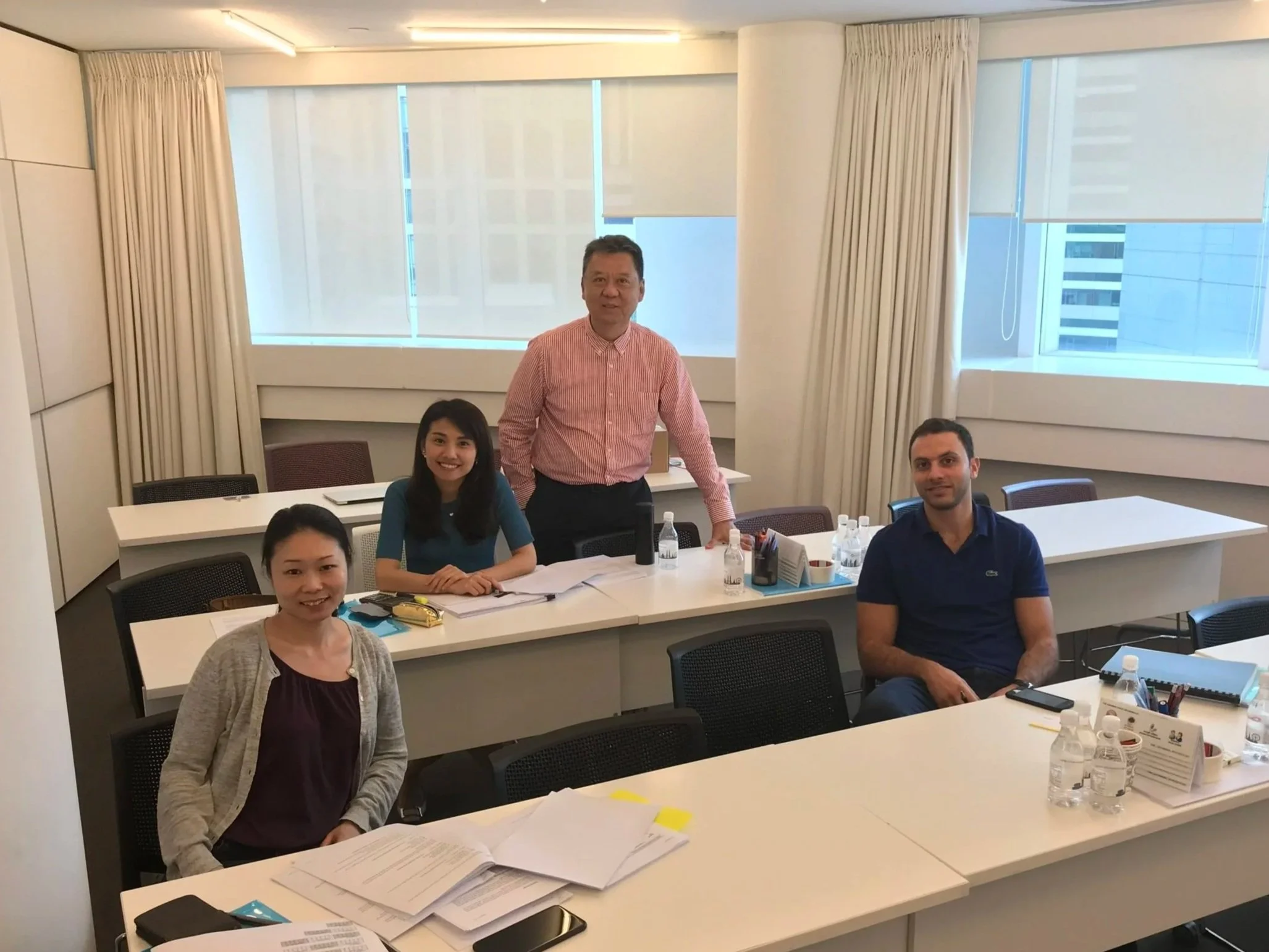 Khinloke delivering CACS exam preparation session in a classroom setting