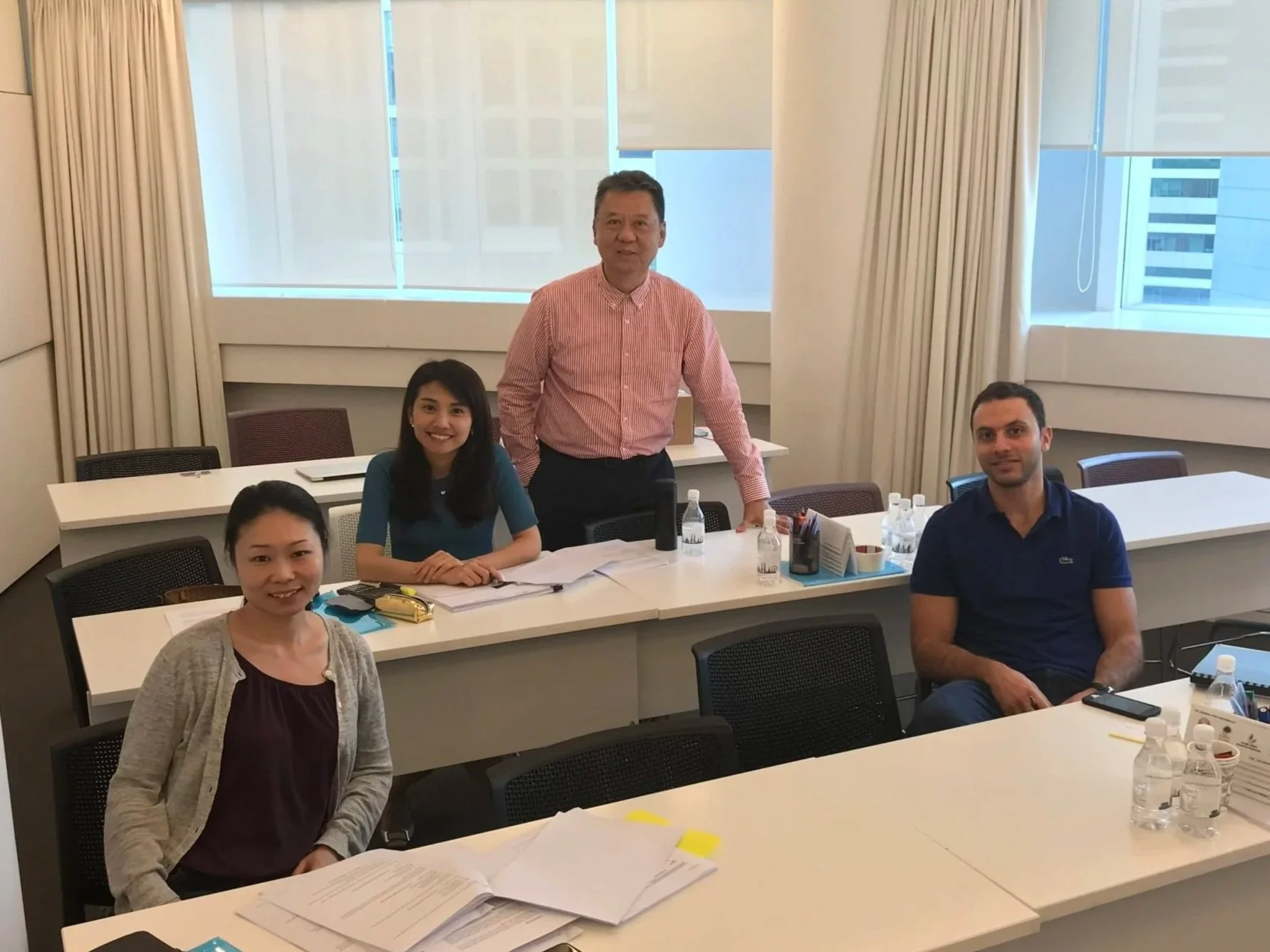 Khinloke delivering CACS exam preparation session in a classroom setting