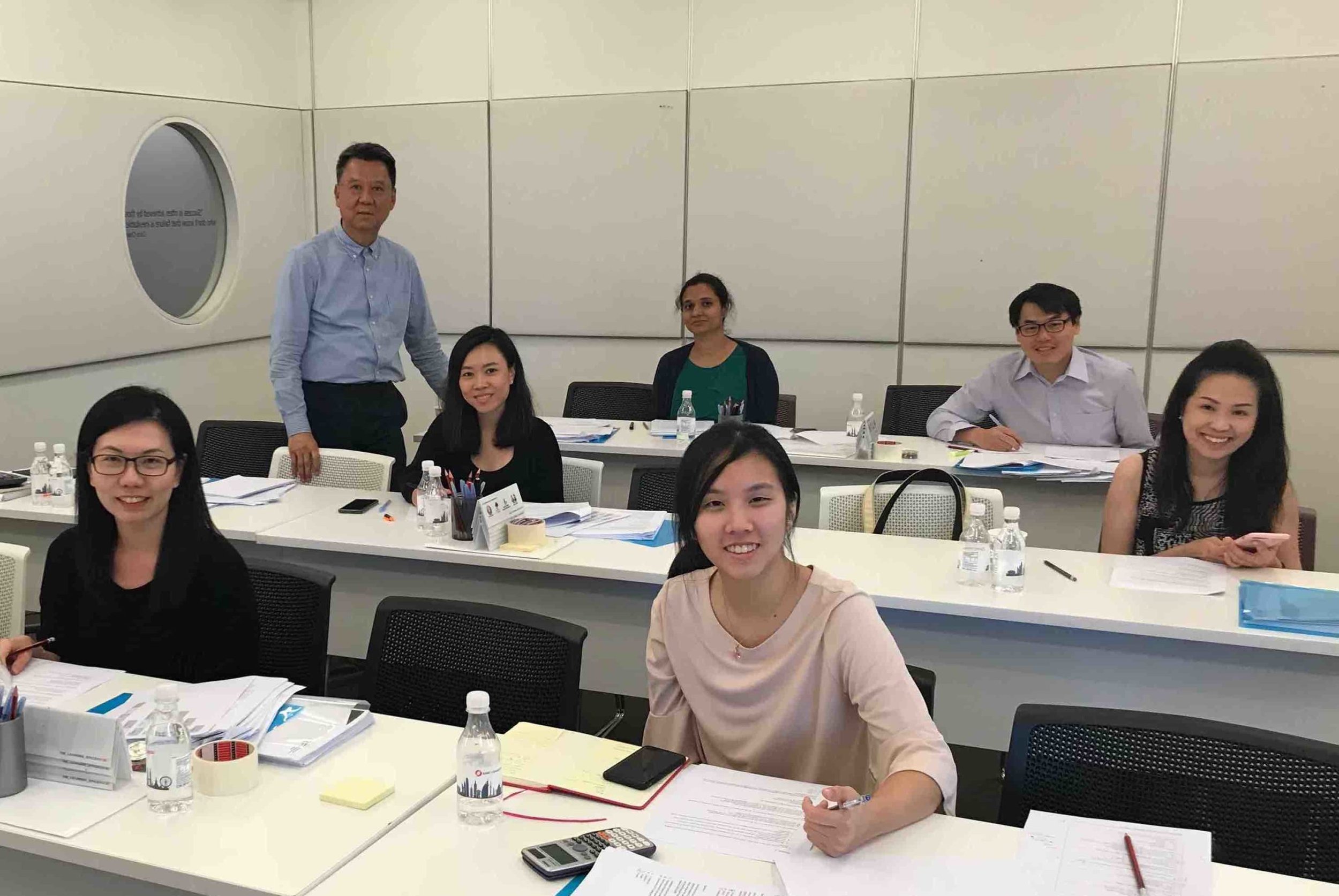 Khinloke conducting CMFAS training for financial professionals