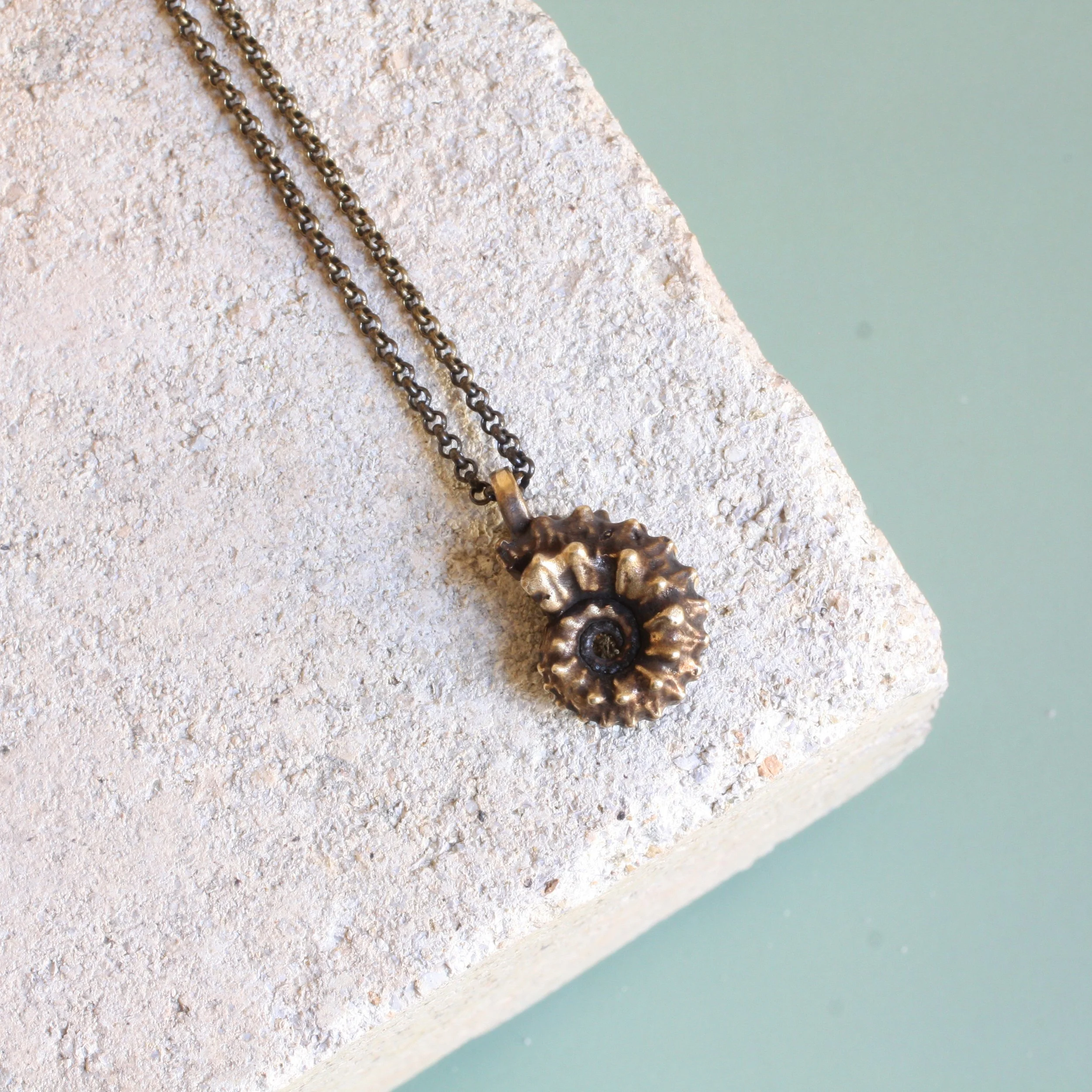 Kosmo Necklace Brass:Brass 1.jpg