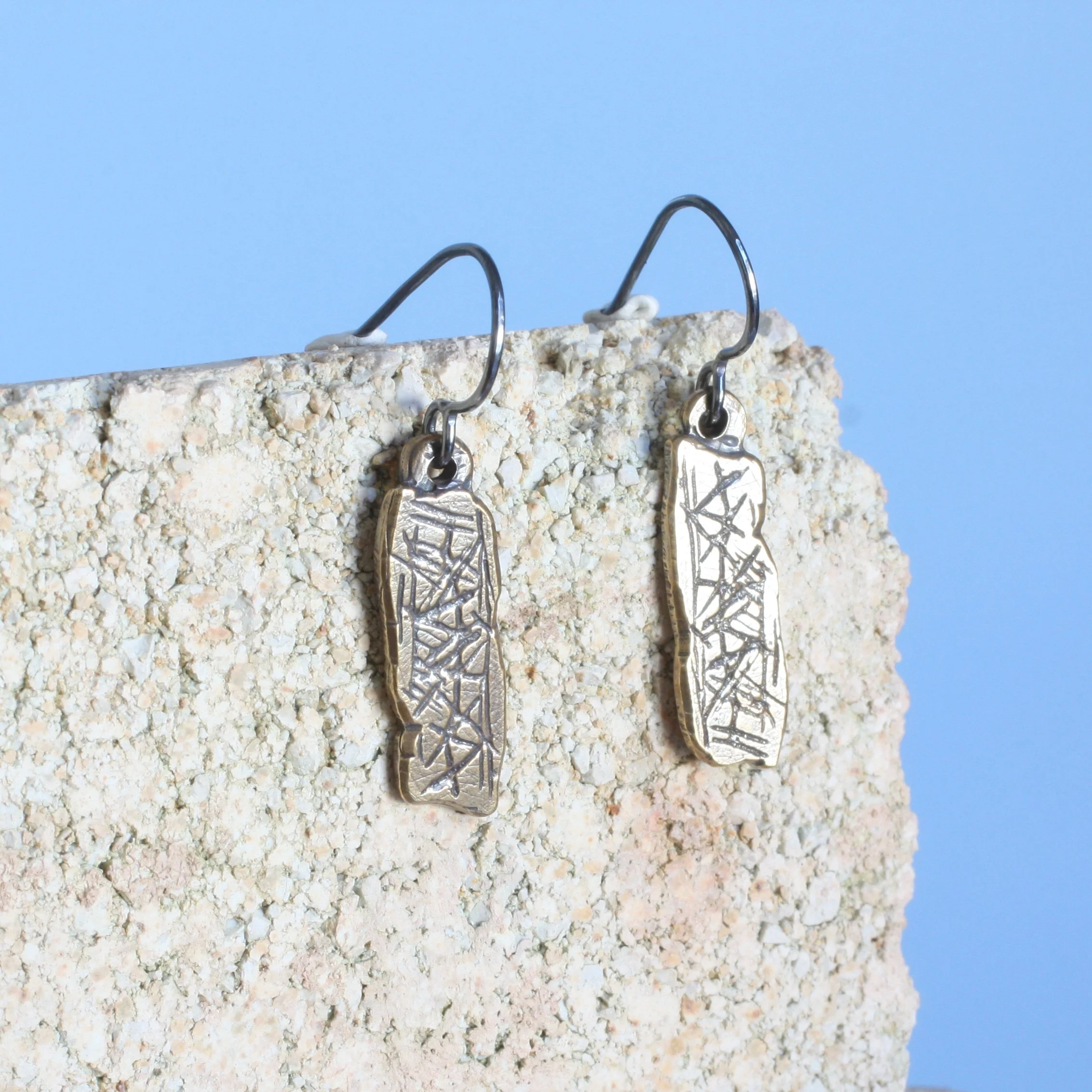 Blombos Earrings Brass 1.jpg