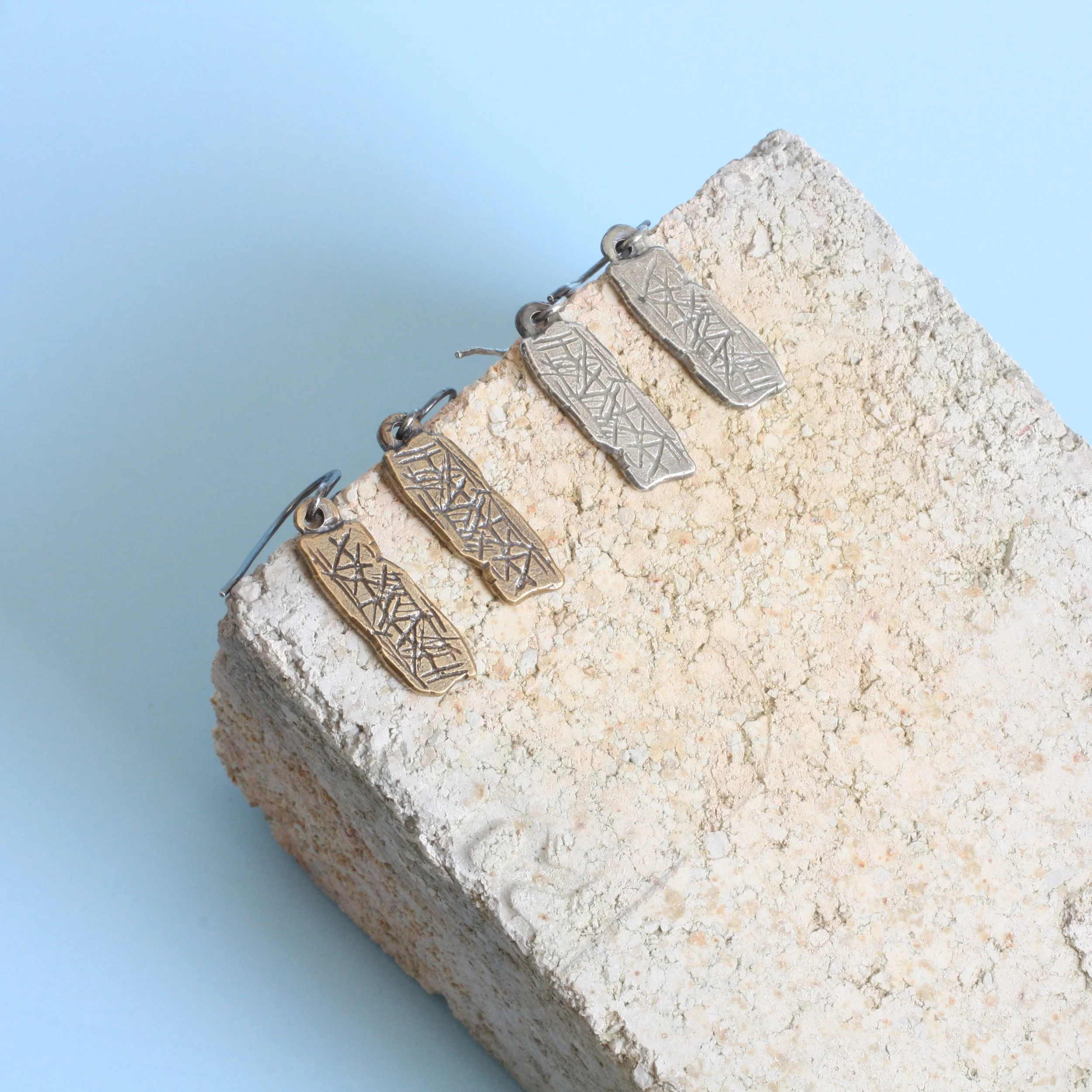 Blombos Earrings Both 1.jpg