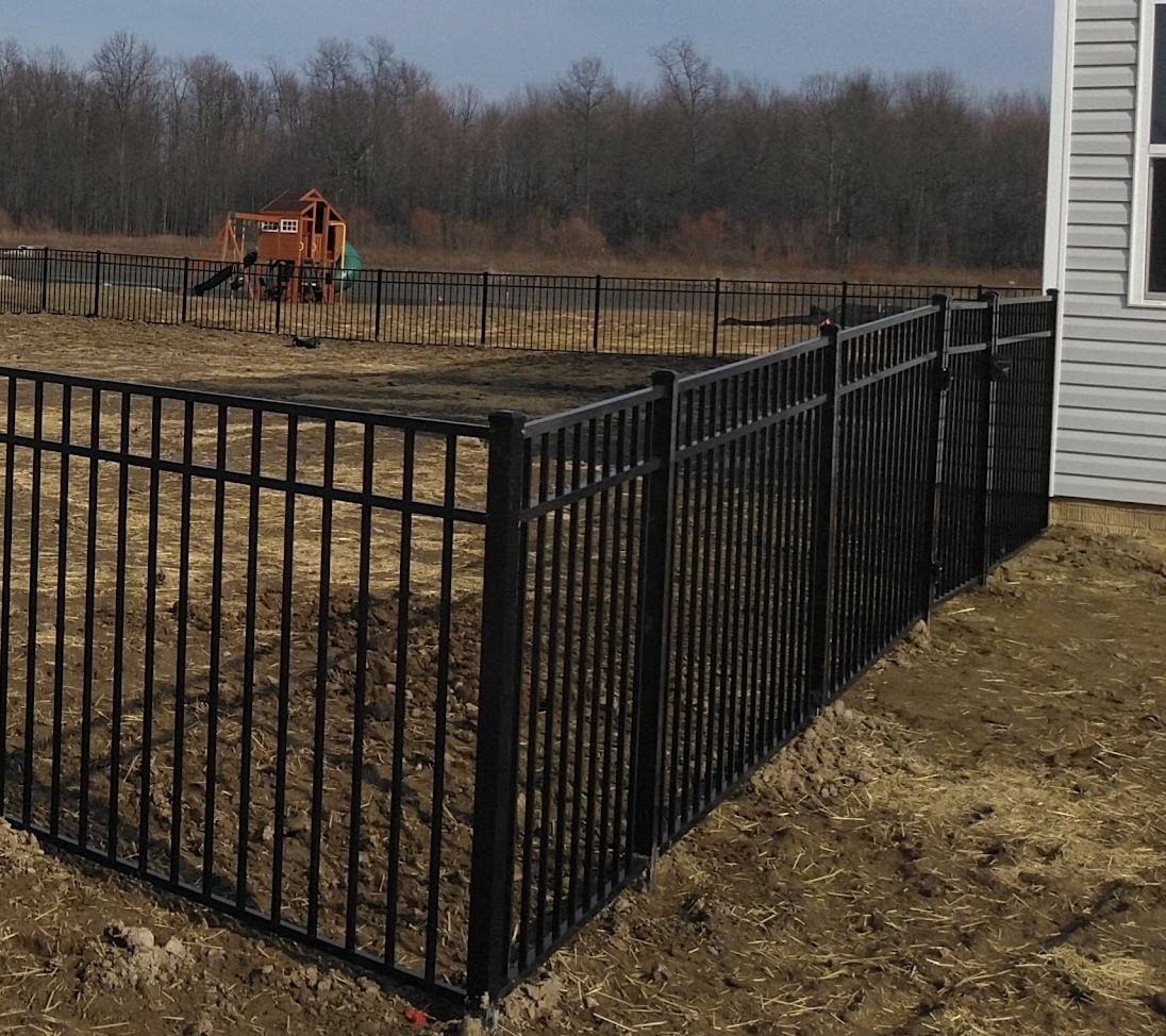 Ornamental fence on a newly built lot