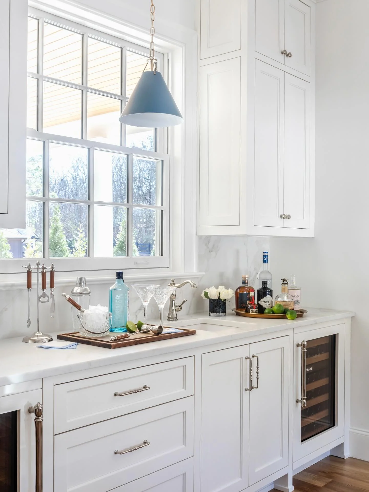 ✨ Super Bowl Sunday starts with the perfect home bar. 🍸🏈 Custom cabinetry, built-in wine fridge, and a space designed for custom cocktail creations &mdash; cheers to football, friends, and beautiful design. Who&rsquo;s ready to entertain?

Builder 