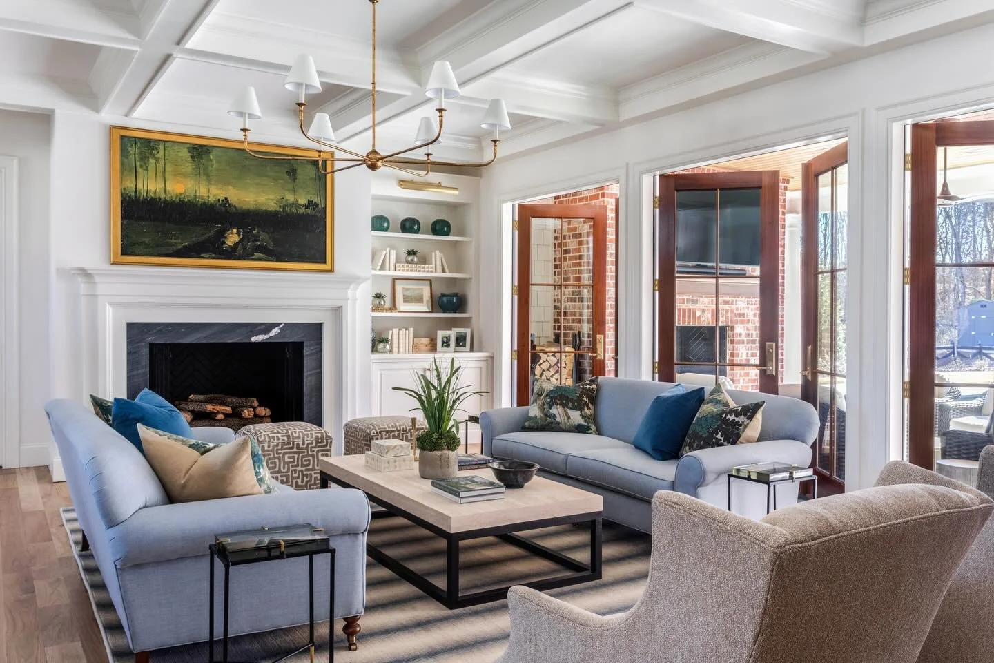 Where timeless design meets everyday living.

From the coffered ceilings and tailored millwork to the seamless flow onto the outdoor lounge, every detail in this space was thoughtfully crafted to feel both elevated and inviting. This is more than a l