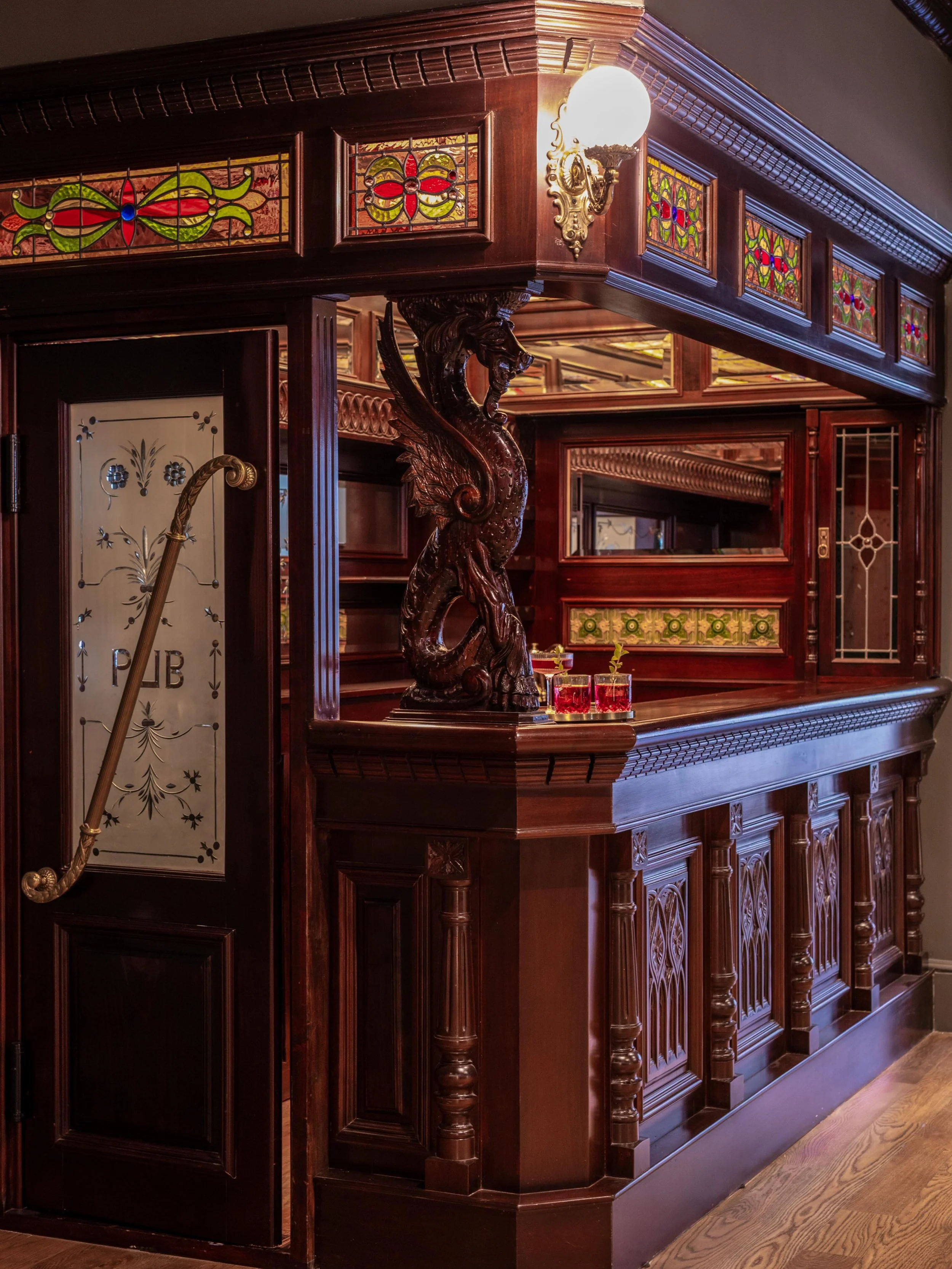 Our clients had a vision for their basement that centered around this incredible antique bar &mdash; and our team made sure every detail felt seamlessly integrated into the home. From lighting and plumbing to architectural planning and millwork coord