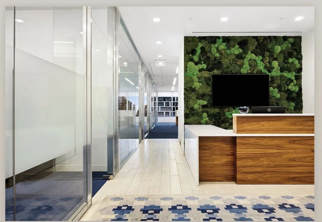 What Is the Benefit of a Moss Wall in an Office?
