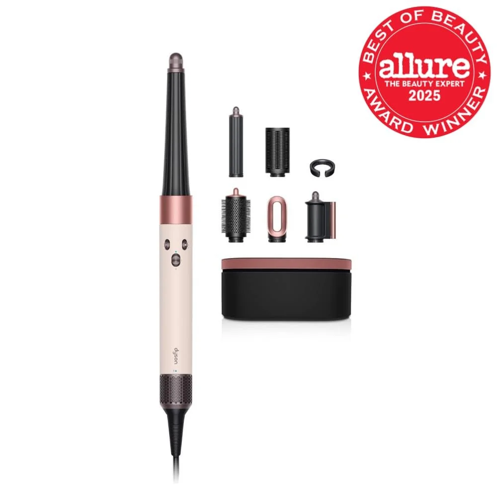 Dyson Airwrap hair styling tool with multiple attachments and a storage case, awarded Allure Best of Beauty 2025.
