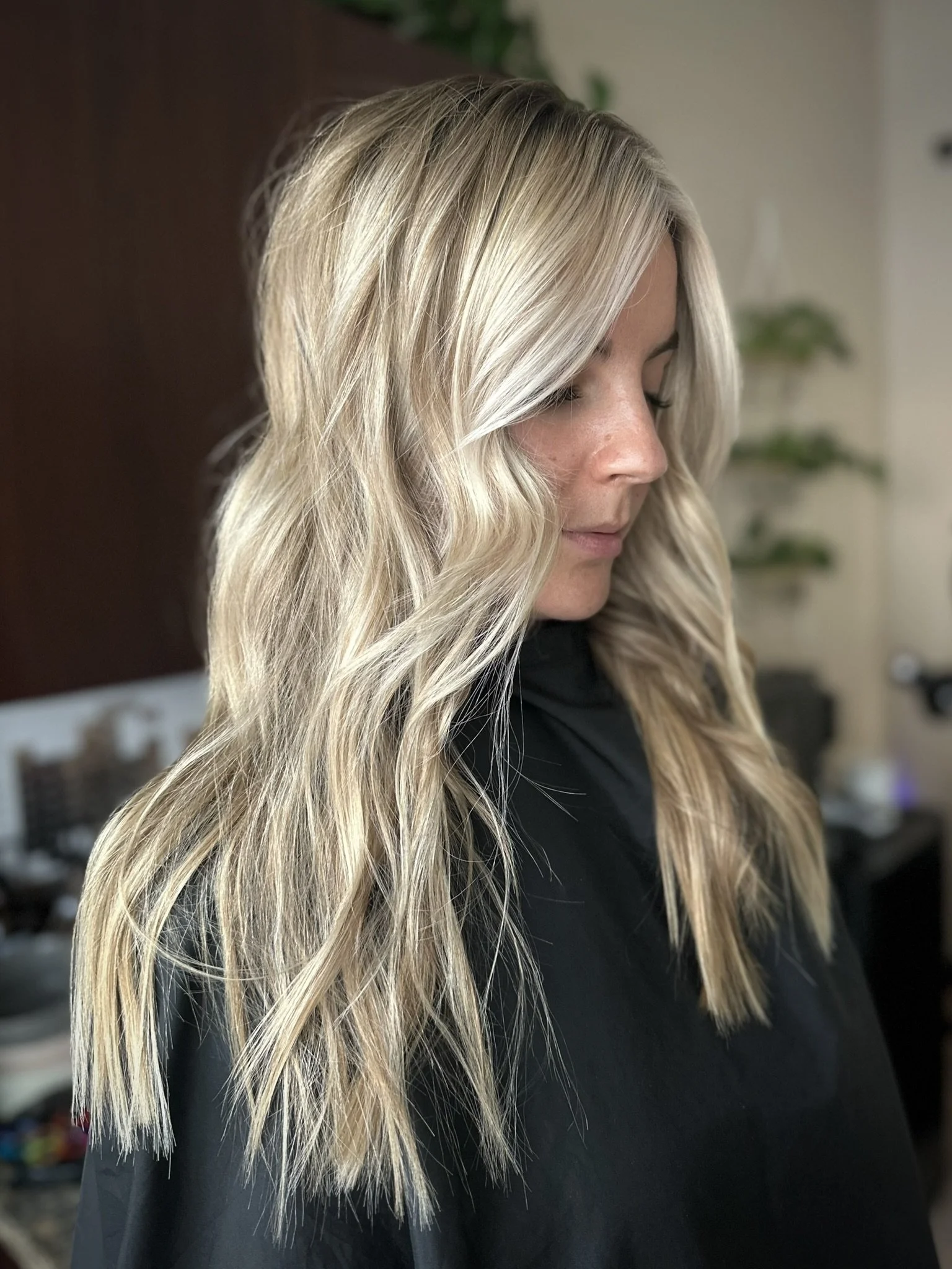 Lived-in blonde balayage featuring bright blonde ribbons, a soft shadow root, and dimensional color created by Leah Taylor Salon, a blonde specialist in St. Petersburg, Florida.