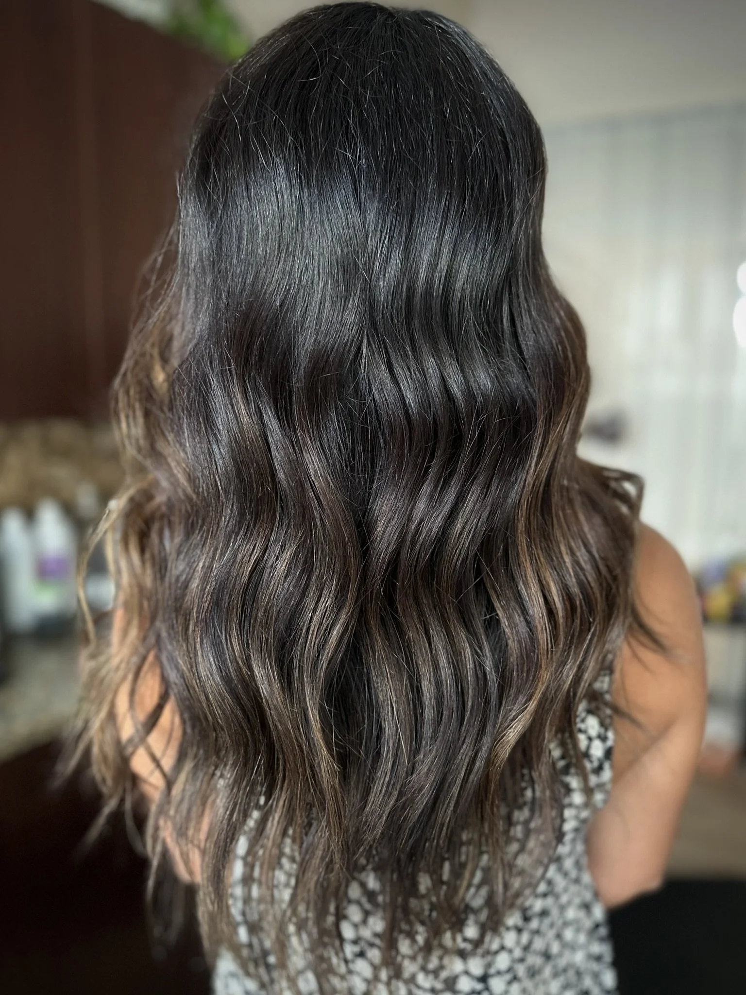 Dimensional brunette balayage featuring rich espresso brunette hair color and soft caramel highlights by Leah Taylor Salon in St. Petersburg, Florida.