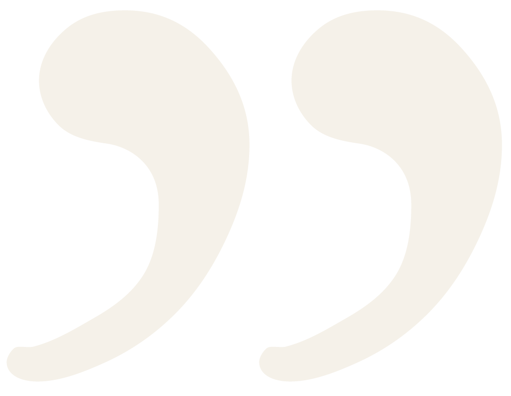 Two white quotation marks on a black background.