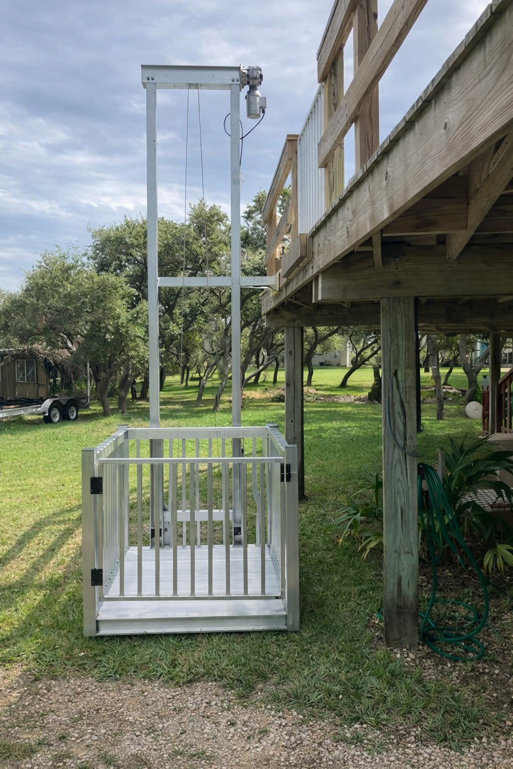 Pro Series cargo lift for elevated deck access on residential home.