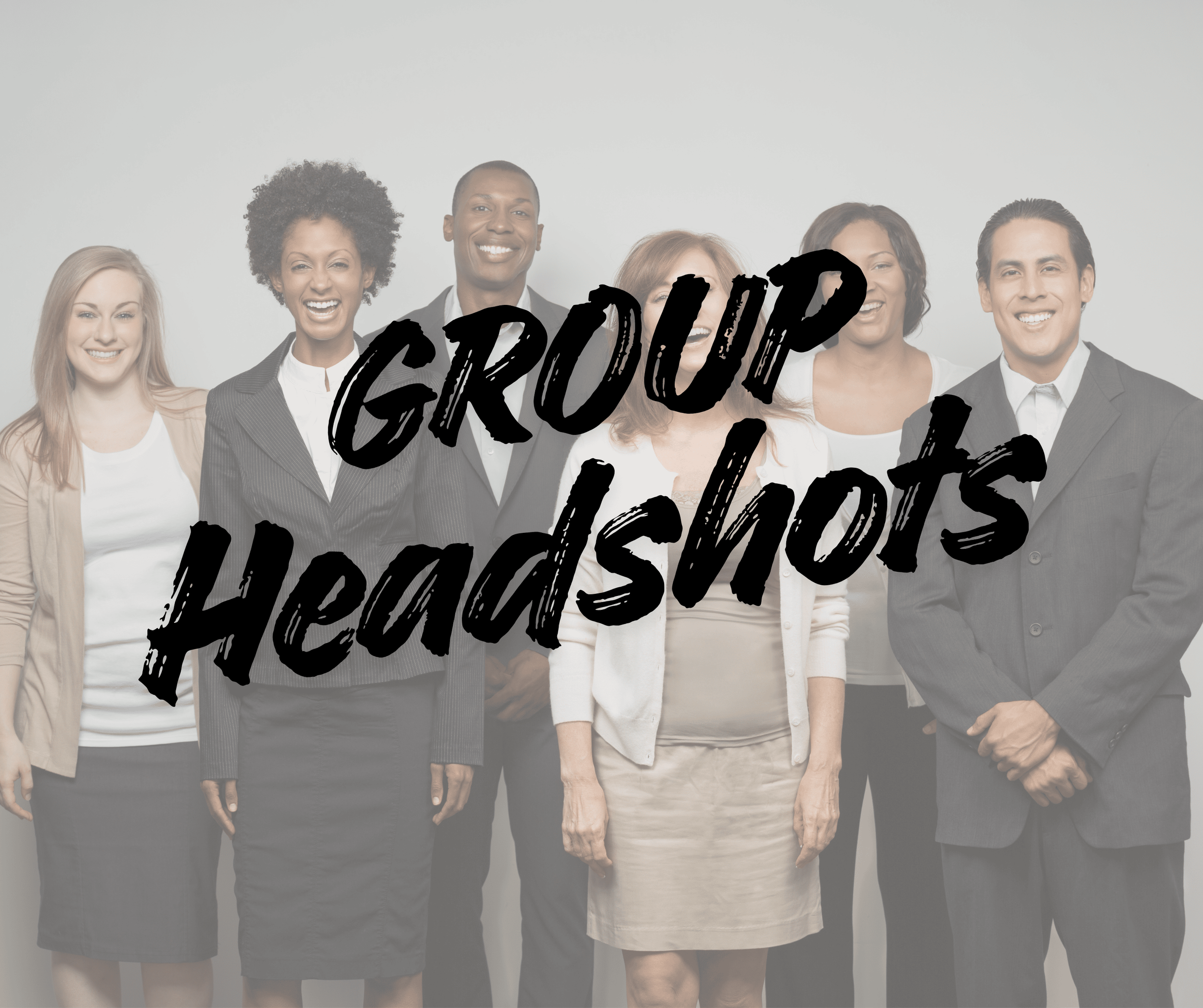 A diverse group of seven professionals in business attire smiling, with black text overlaying the image that reads 'GROUP HEADSHOTS'.