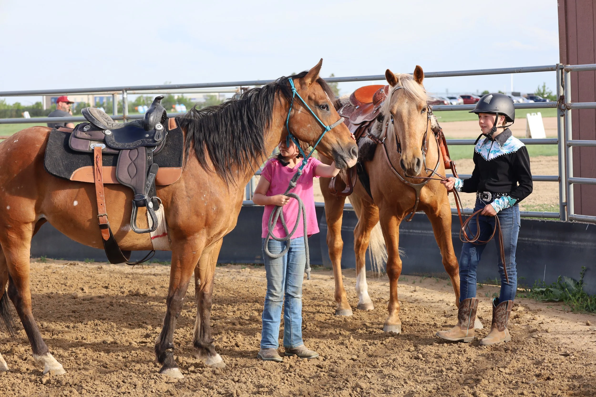 Two 4-Hers with their horses