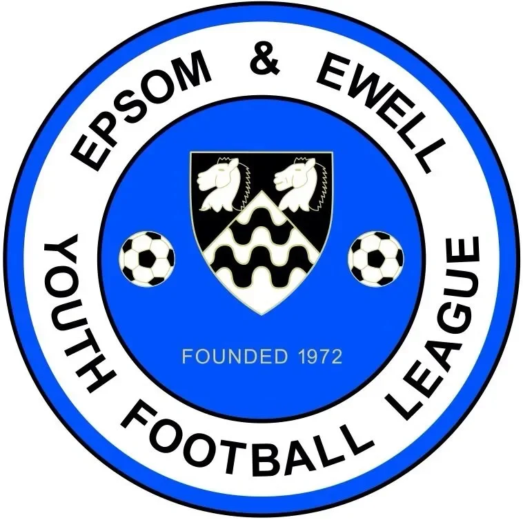 Logo of Epsom & Ewell Youth Football League, featuring two soccer balls, a shield with two horse heads, and a black and white zigzag pattern, with the text 'Founded 1972' and the league name encircling the emblem.