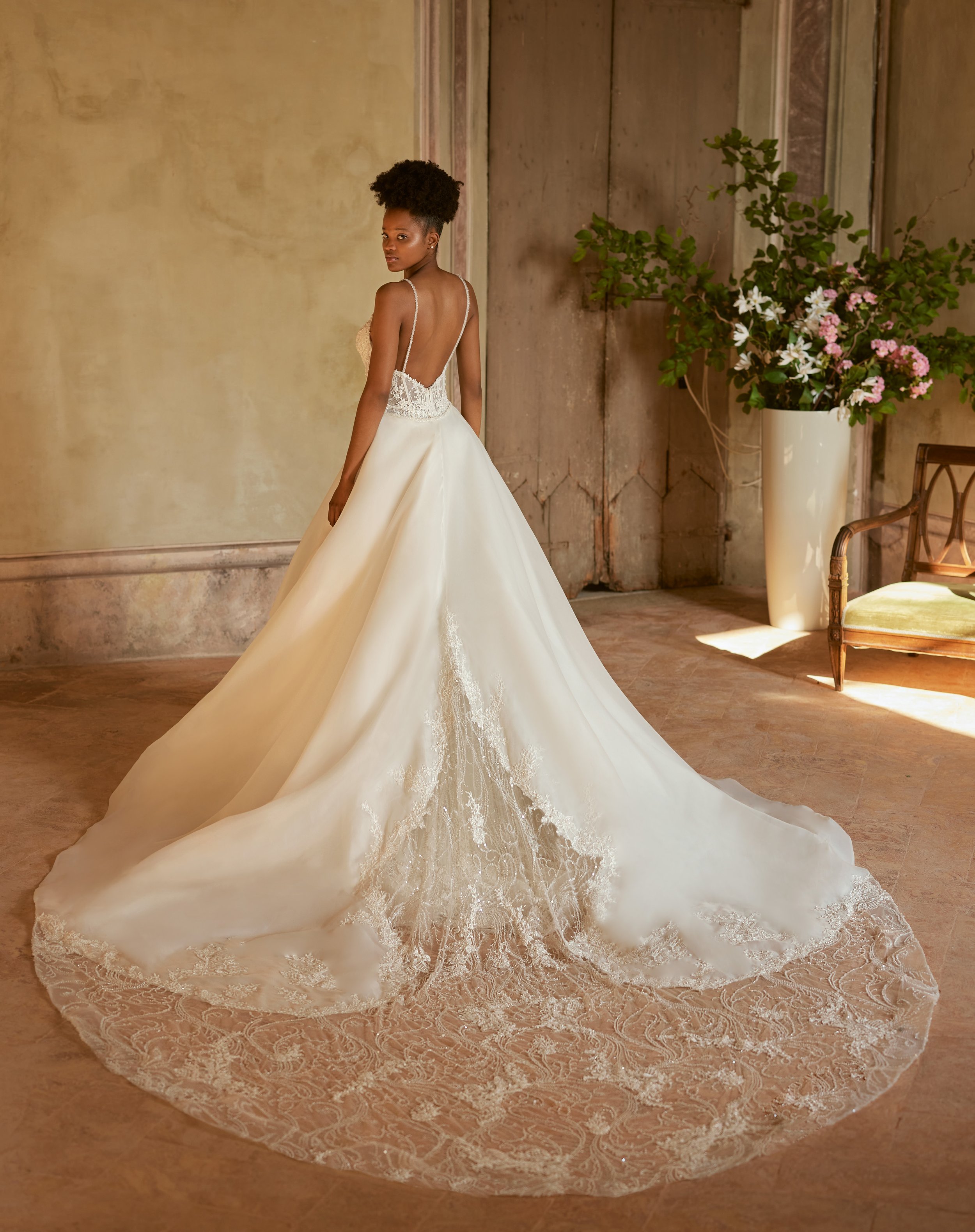 Madam Burcu Style 5023 A-line wedding gown with plunging V-neck, beaded lace mermaid underlayer, and detachable overskirt in ivory champagne