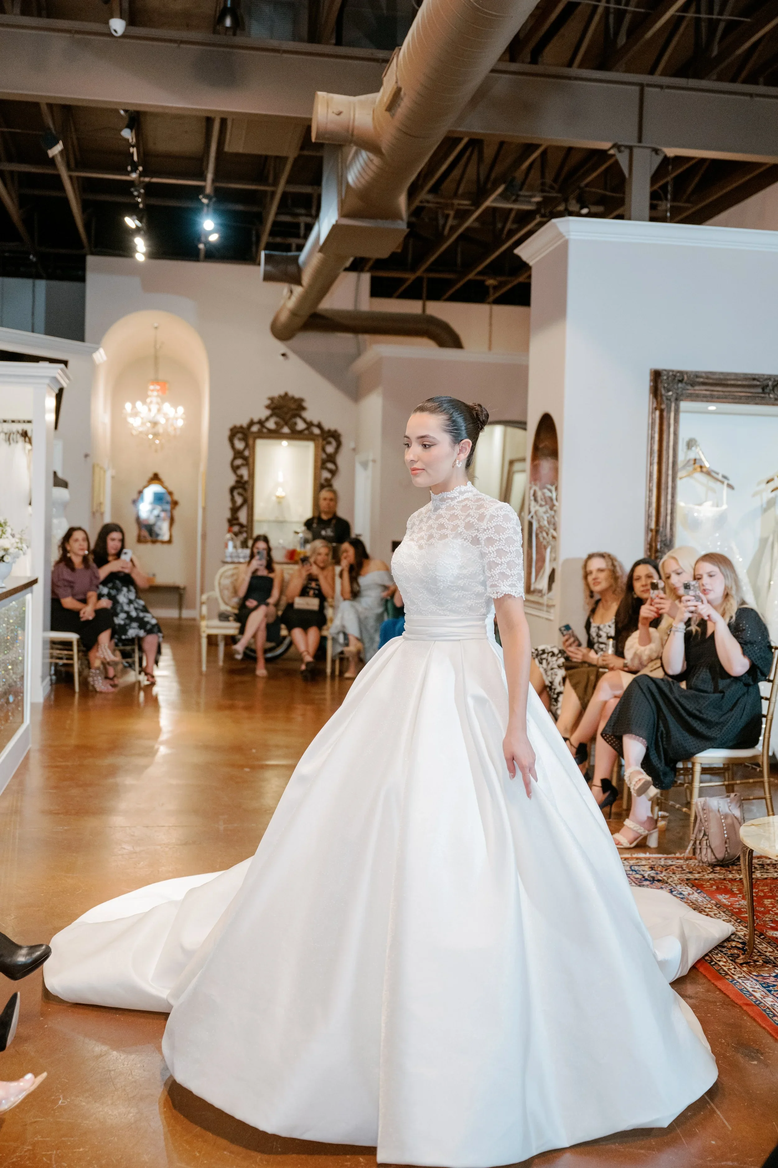 Elizabeth Lee Sylvie vintage-inspired ballgown wedding dress with illusion lace bodice, high mandarin collar, short lace sleeves, and pleated satin skirt.