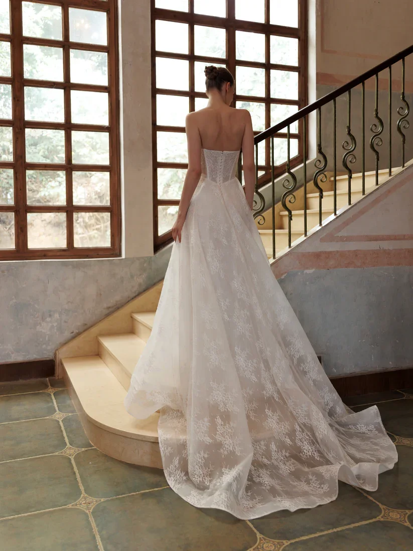 A-Line with basque waist and tulle alongside a long train and veil option