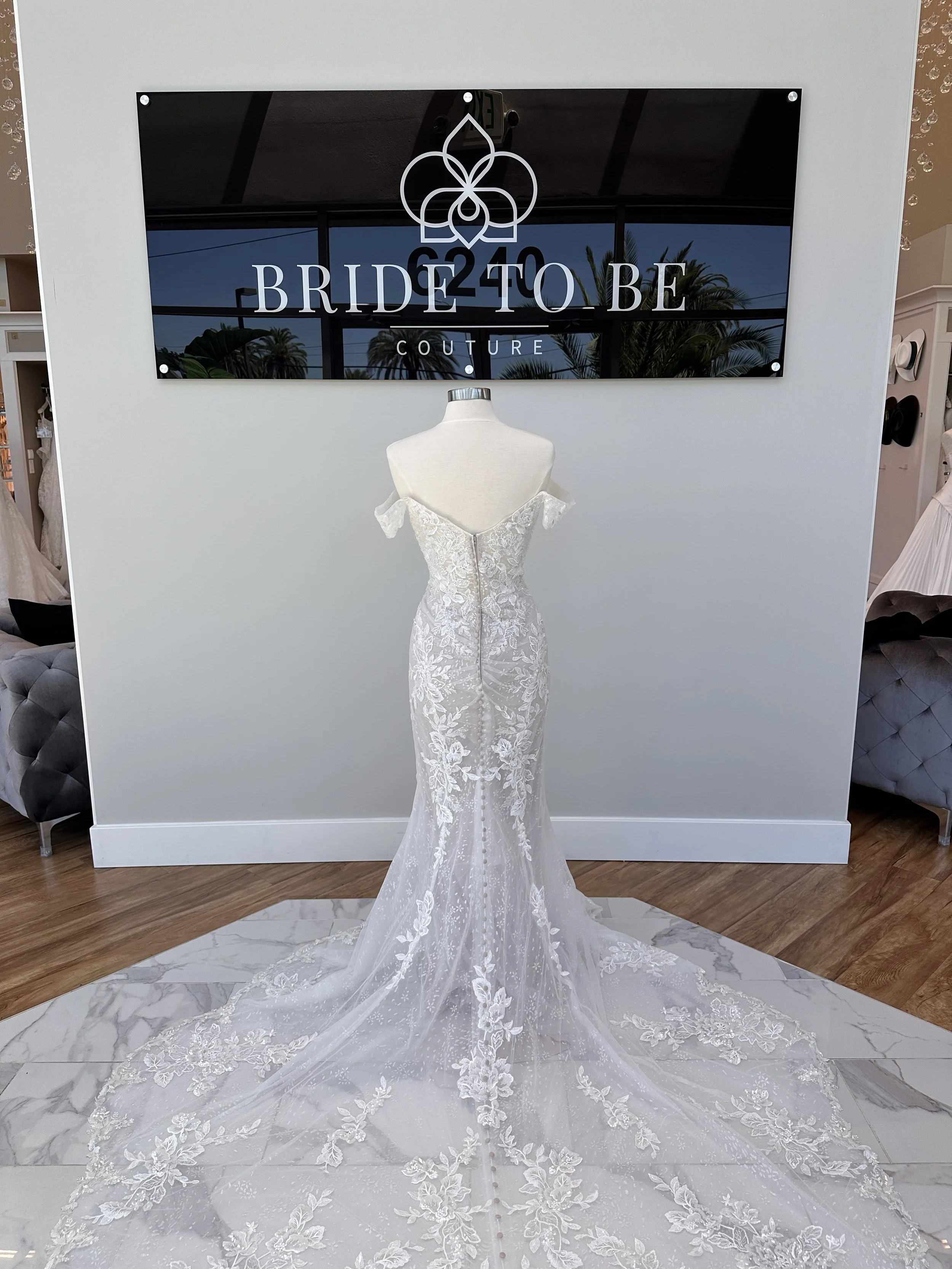 Legacy Diana lace fit-and-flare wedding dress with off-the-shoulder sleeves at Bride To Be Couture Sacramento
