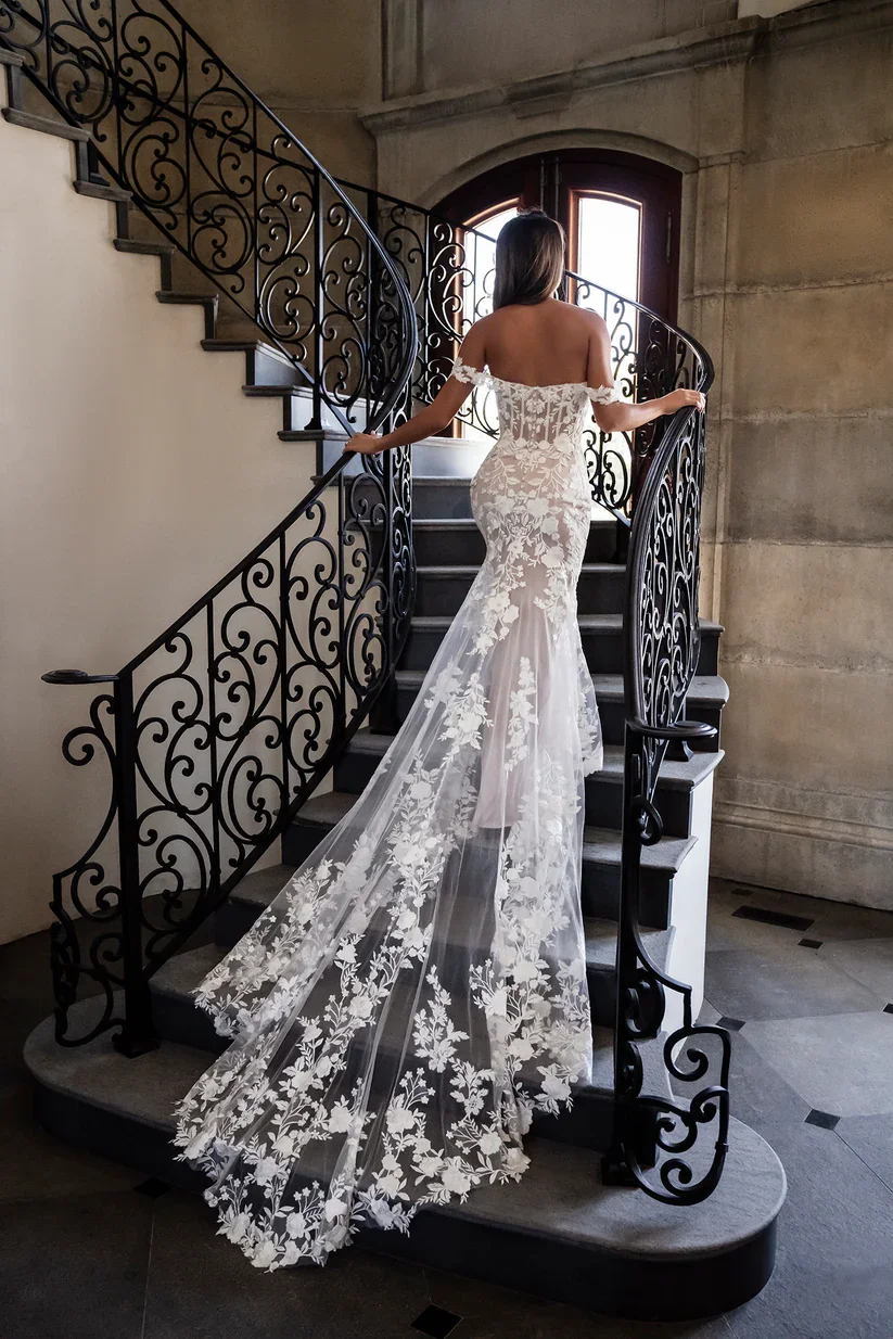 Romantic Off the Shoulder Sheath Wedding Dress With Sheer Tulle Train and Tonal Sequined Lace Blossoms