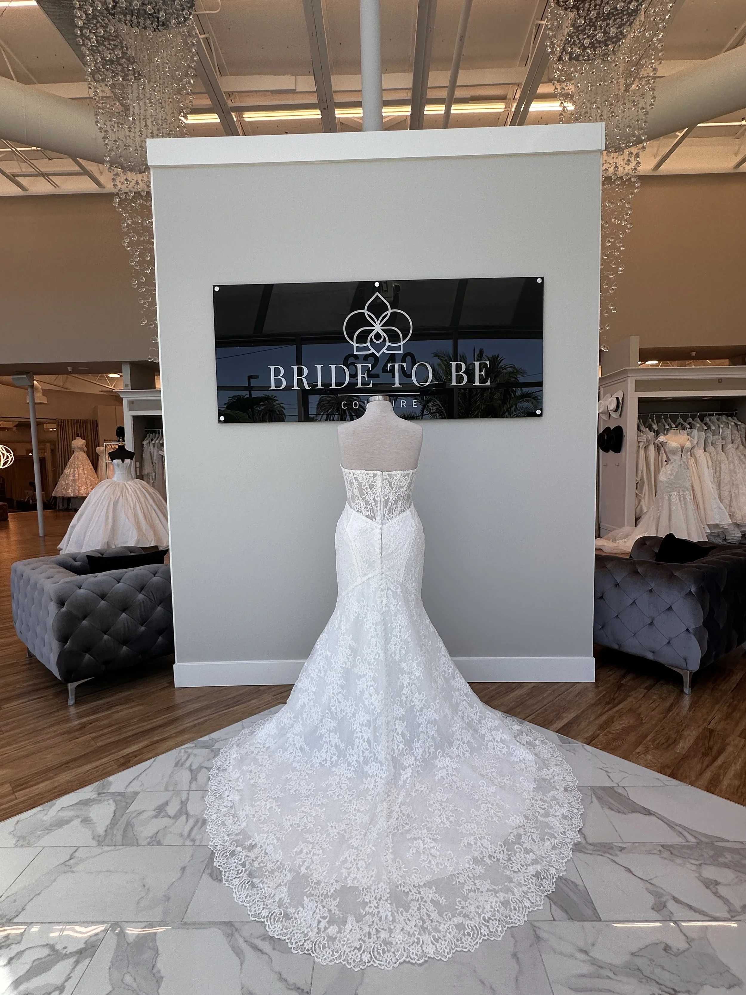 Bride wearing the Legacy Rosalind lace strapless fit-and-flare wedding dress at Bride To Be Couture Sacramento.