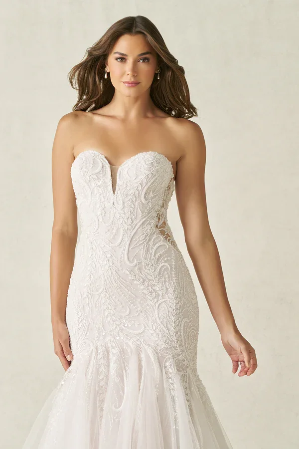 strapless fit-and-flare wedding gown with sweetheart neckline, swirling lace bodice, beaded and pearl accents, and sparkle tulle skirt