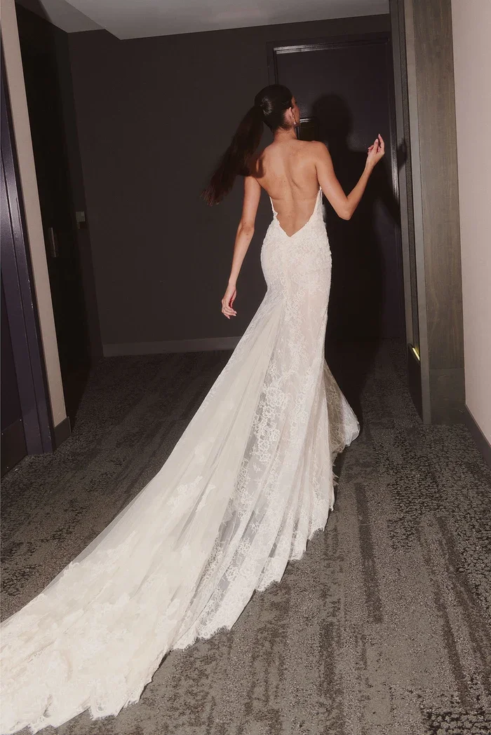 Stretch lace sheath gown with structured lace and center back drop