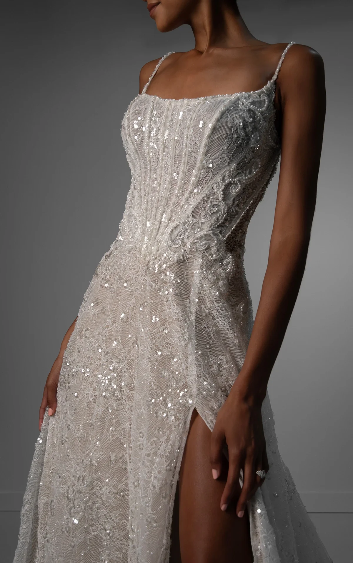 Martina Liana Luxe LE1385 Art Deco-inspired A-line wedding dress with beaded spaghetti straps, square neckline, couture lace appliqués, and low V-back, available at Bride To Be Couture in Sacramento