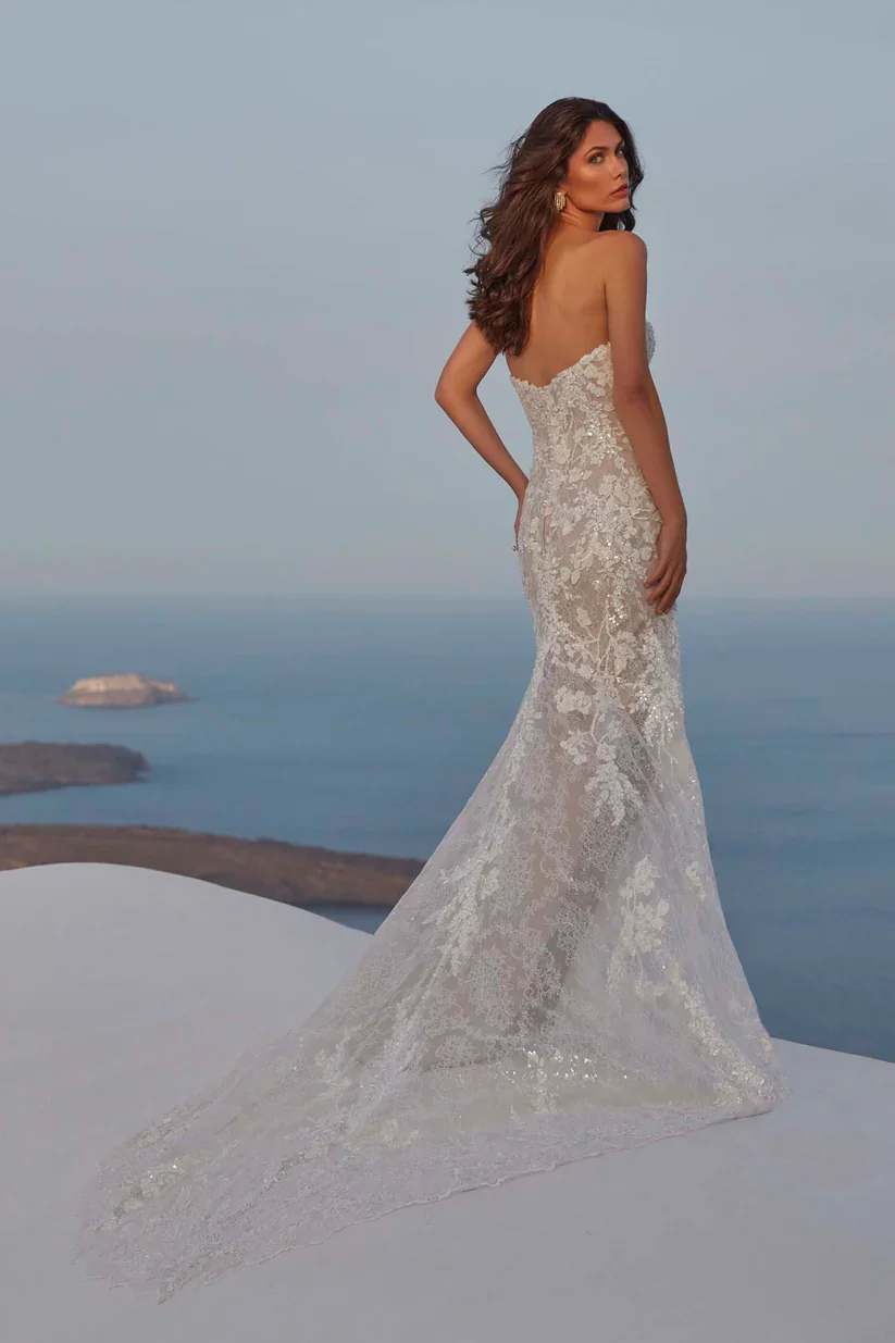 Madison James Francesca beaded and sequined Chantilly lace strapless sheath wedding gown.