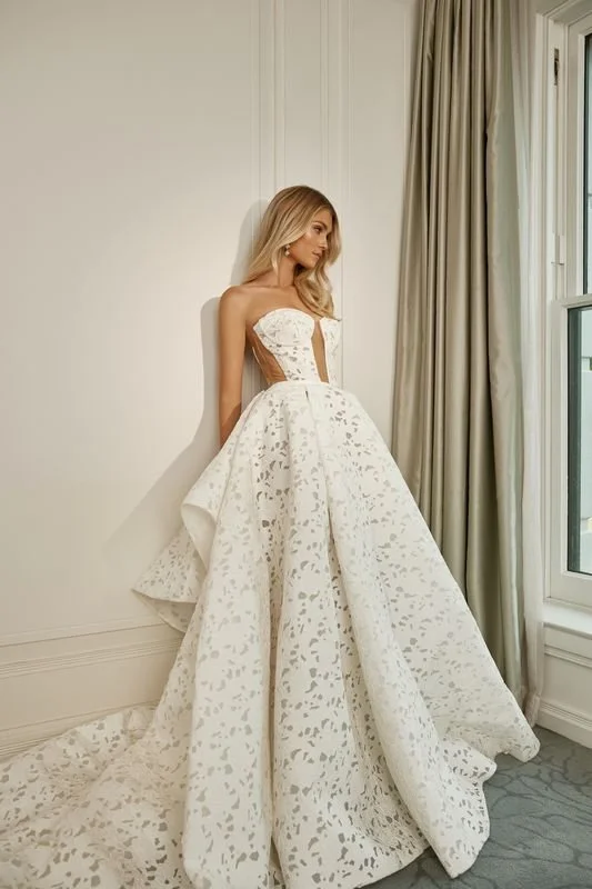 La Premiere Lucia laser-engraved satin ballgown wedding dress with strapless sweetheart neckline.