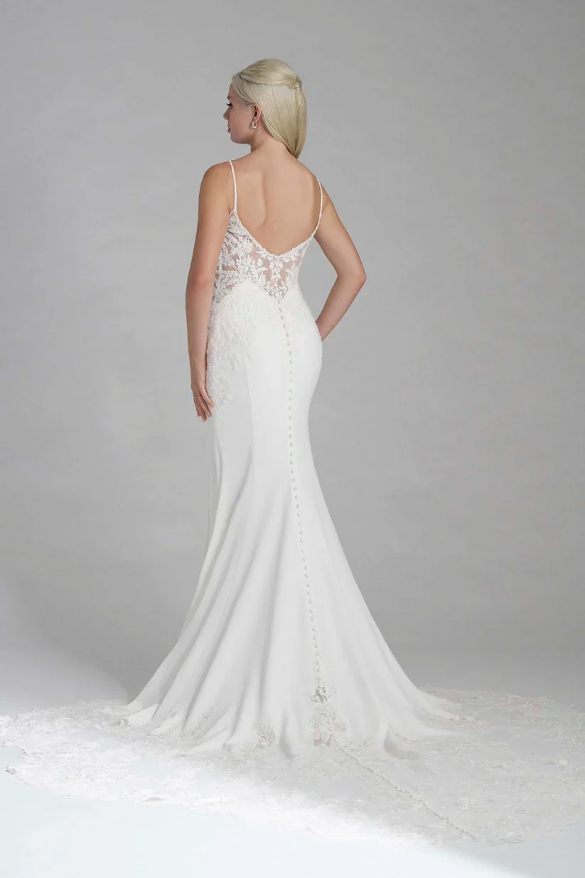 Madison James Elliotte bold wedding gown with plunging sweetheart neckline and sheer bodice with exposed boning.
