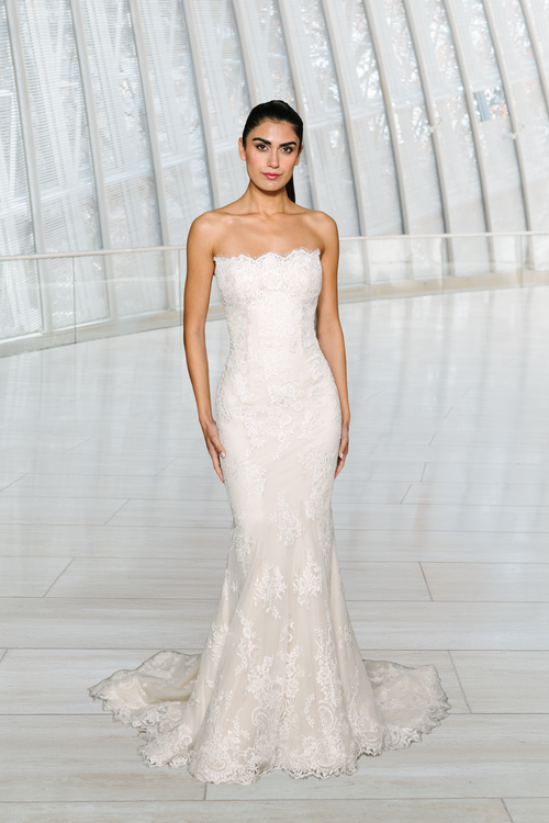 Elizabeth Lee Lyra strapless sweetheart lace mermaid gown with a detachable lace ballgown overskirt, available at Bride To Be Couture in Sacramento.
