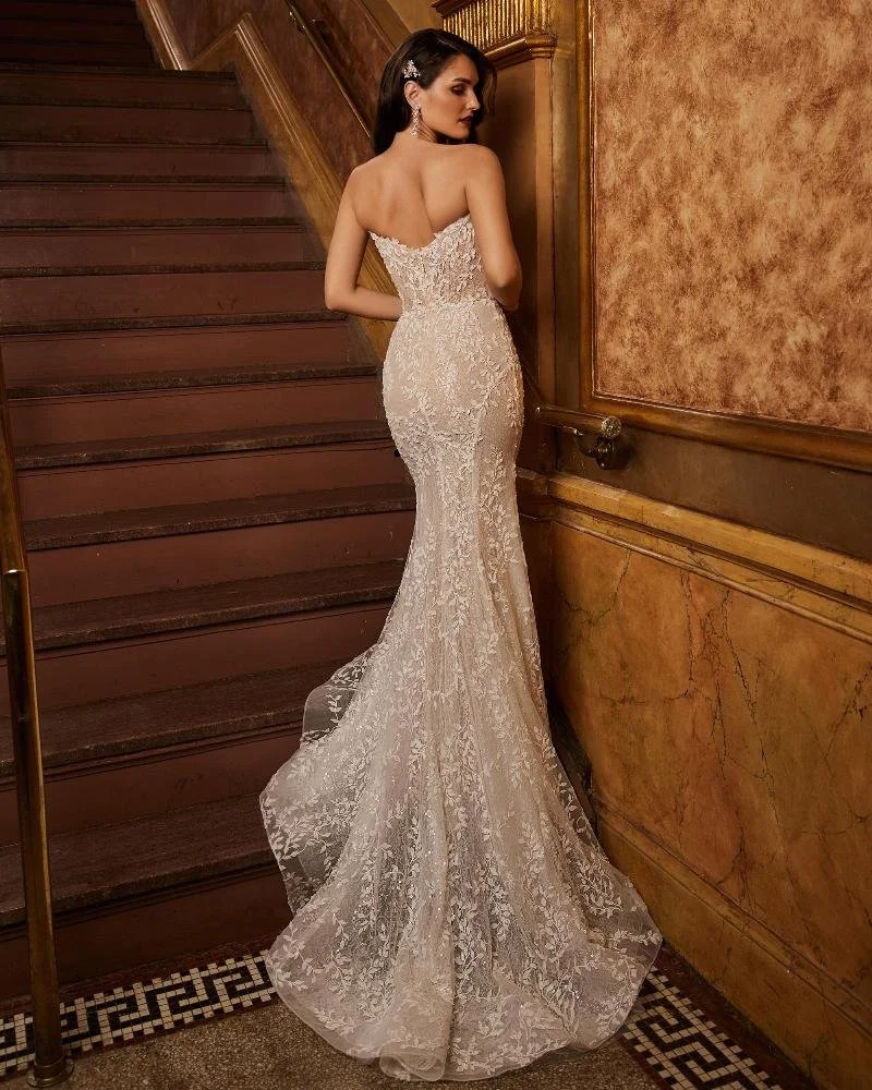 Calla Blanche Bita 122102 strapless sweetheart sheath wedding dress with corset bodice, beaded lace, and optional detachable off-the-shoulder puff long sleeves.