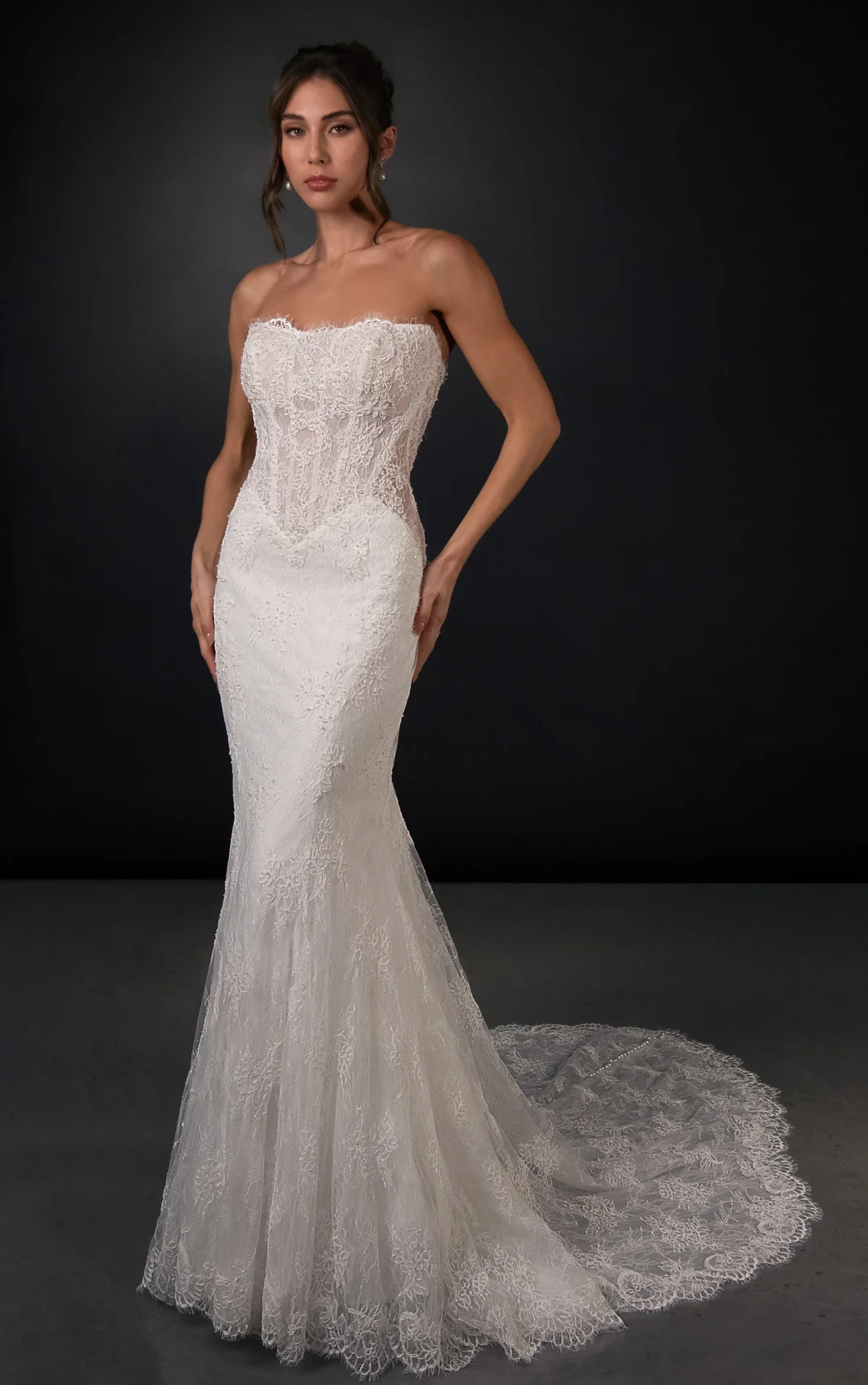 Martina Liana ML2010 lace fit-and-flare wedding dress with sweetheart corset bodice and detachable lace capelet at Bride To Be Couture Sacramento Front.webp