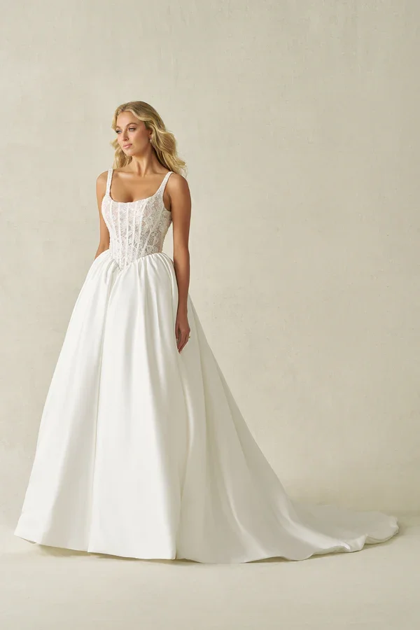 ballgown wedding dress with scoop neckline, delicate straps, beaded and sequin lace bodice, basque waist, and sleek satin skirt