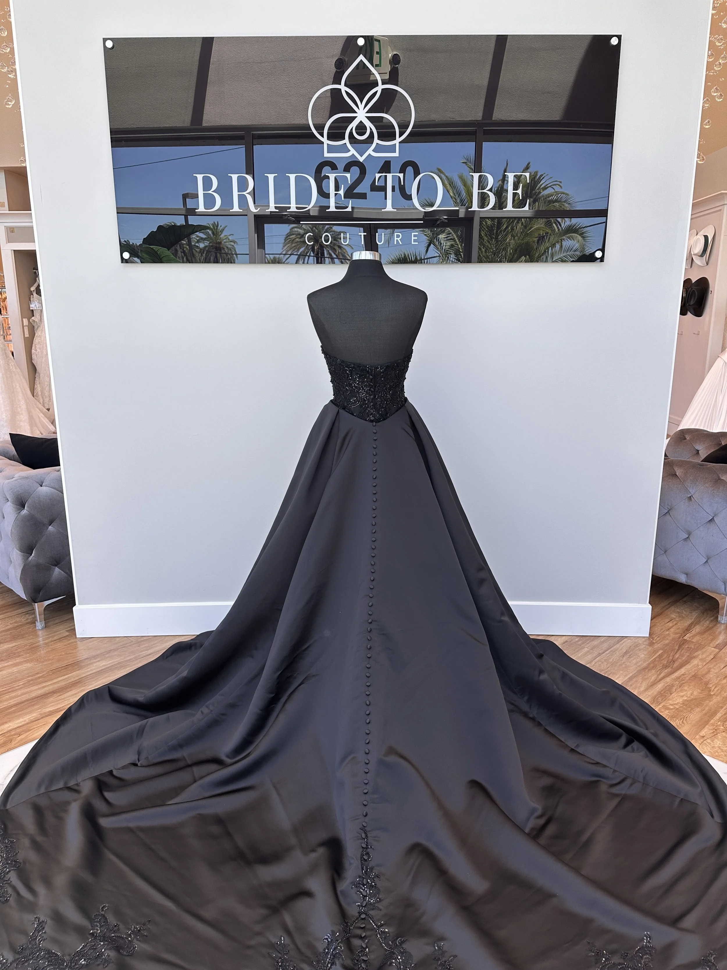 Legacy Amelia satin wedding dress with corset bodice at Bride To Be Couture Sacramento.
