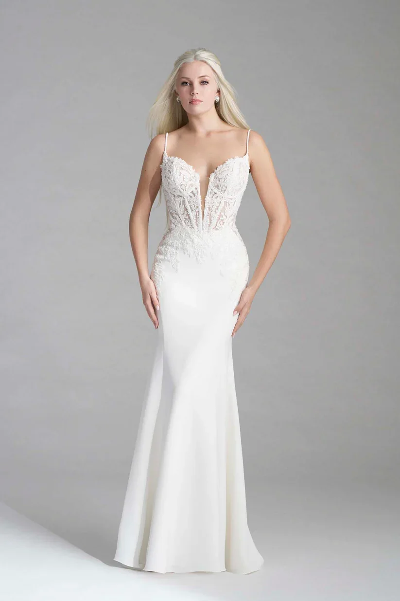 Madison James Elliotte bold wedding gown with plunging sweetheart neckline and sheer bodice with exposed boning.