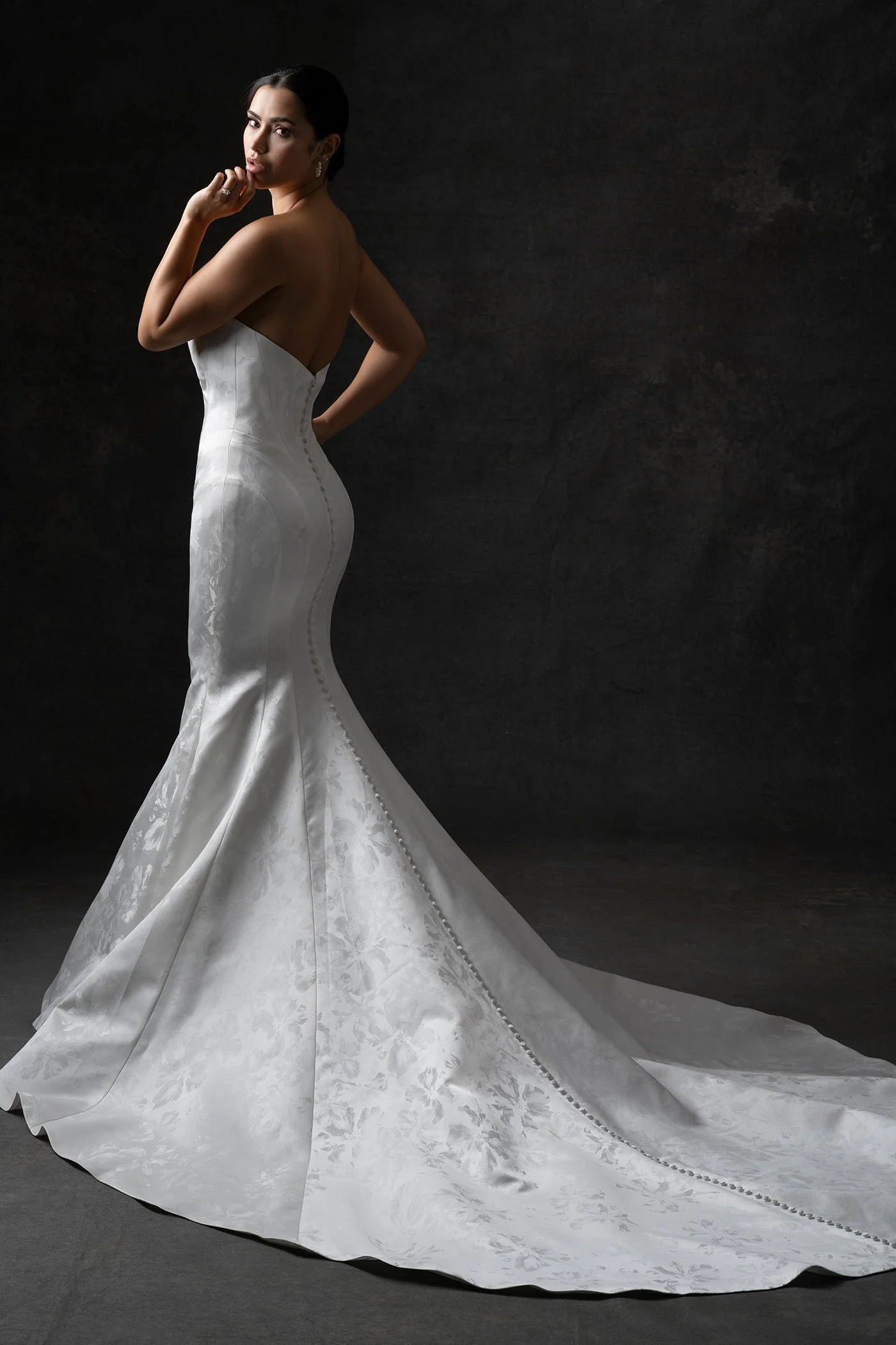 Allure Couture C746 strapless sweetheart fit and flare wedding gown in sculptural jacquard satin with a soft embossed floral motif.