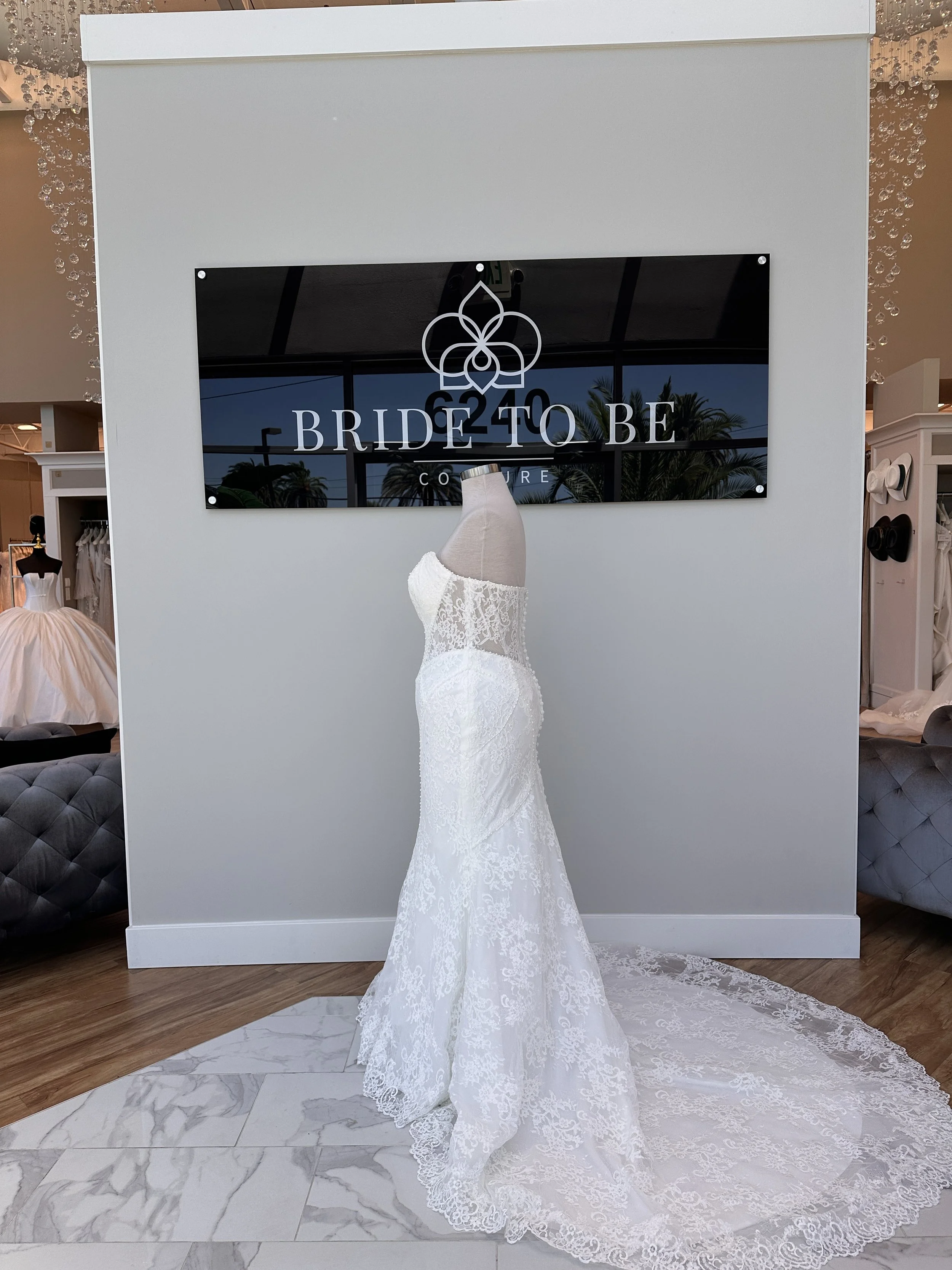 Bride wearing the Legacy Rosalind lace strapless fit-and-flare wedding dress at Bride To Be Couture Sacramento.