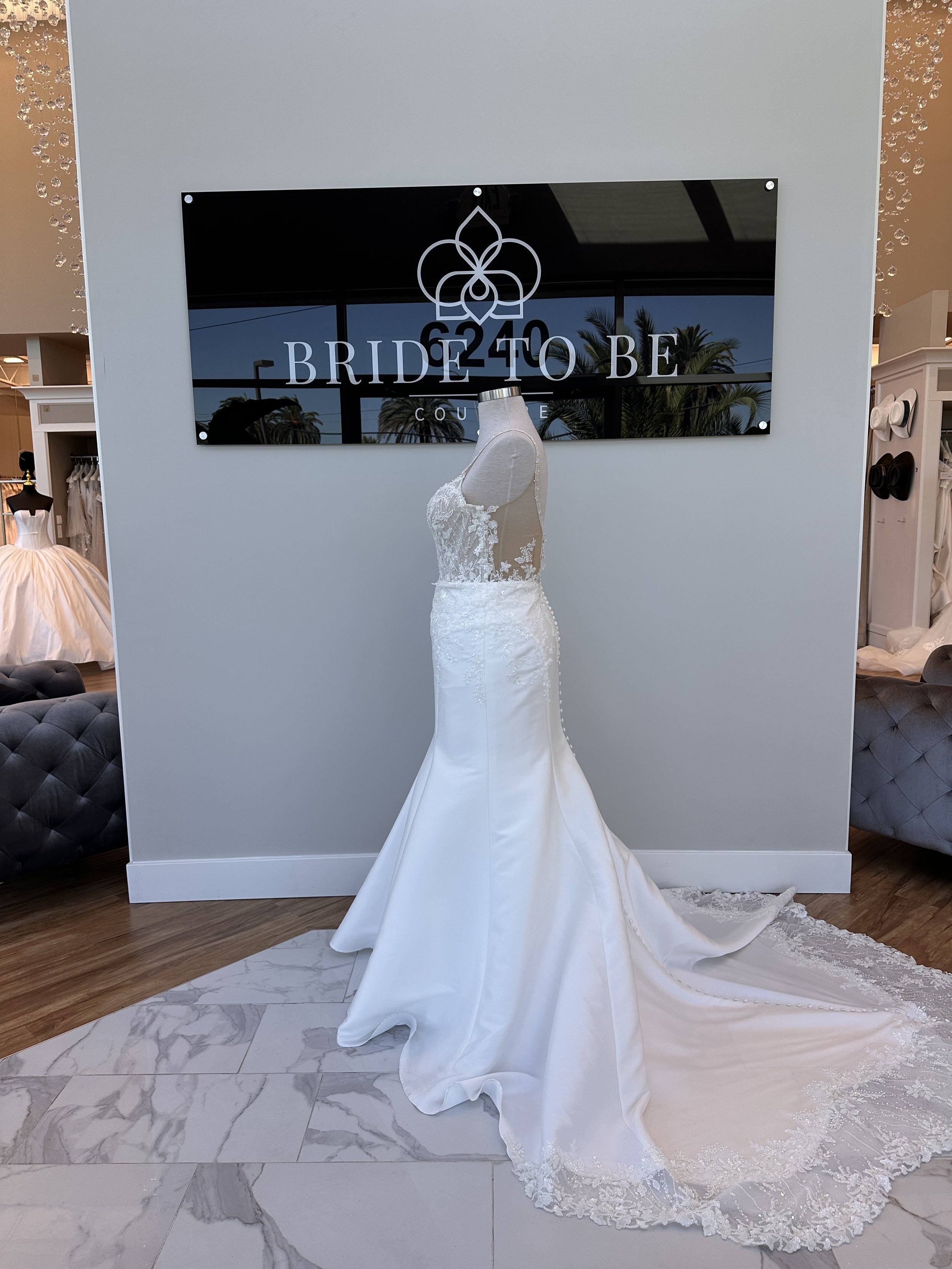 Legacy Eleanor wedding dress featuring a lace bodice, scoop neckline, and fitted satin silhouette at Bride To Be Couture in Sacramento.