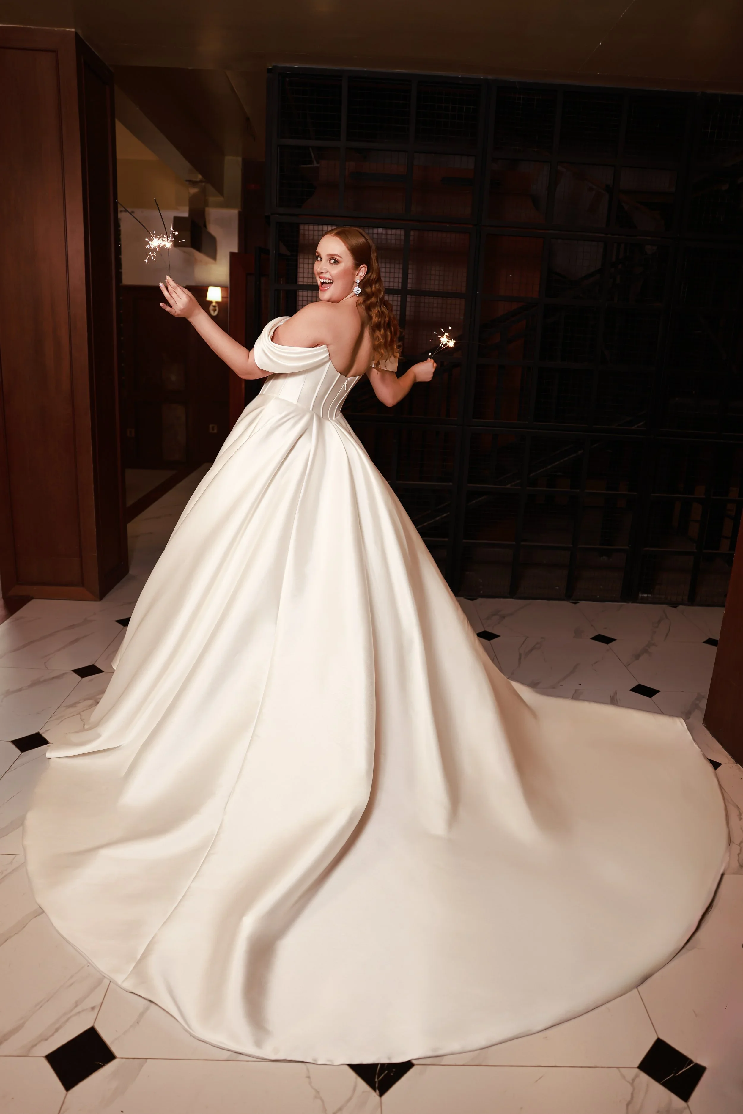 Dany Tabet Beckett DG0025W422 plus size off-the-shoulder sweetheart satin ballgown wedding dress with exposed boning corset bodice and dramatic sweep skirt.