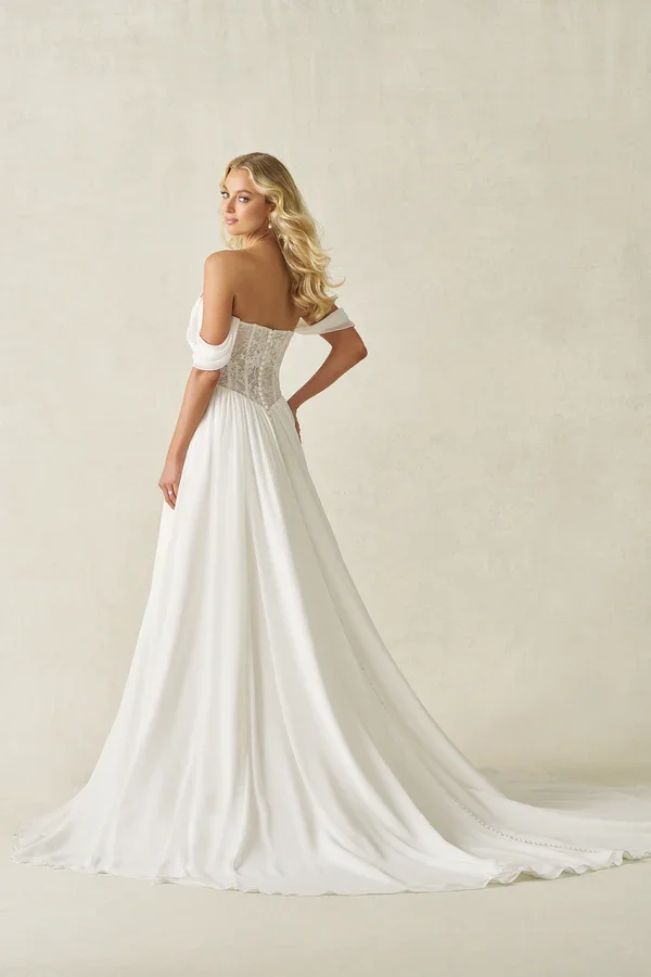 A-line wedding gown with bold lace bodice, V-neckline, basque waist, front slit, flowing chiffon skirt, and detachable chiffon sleeves